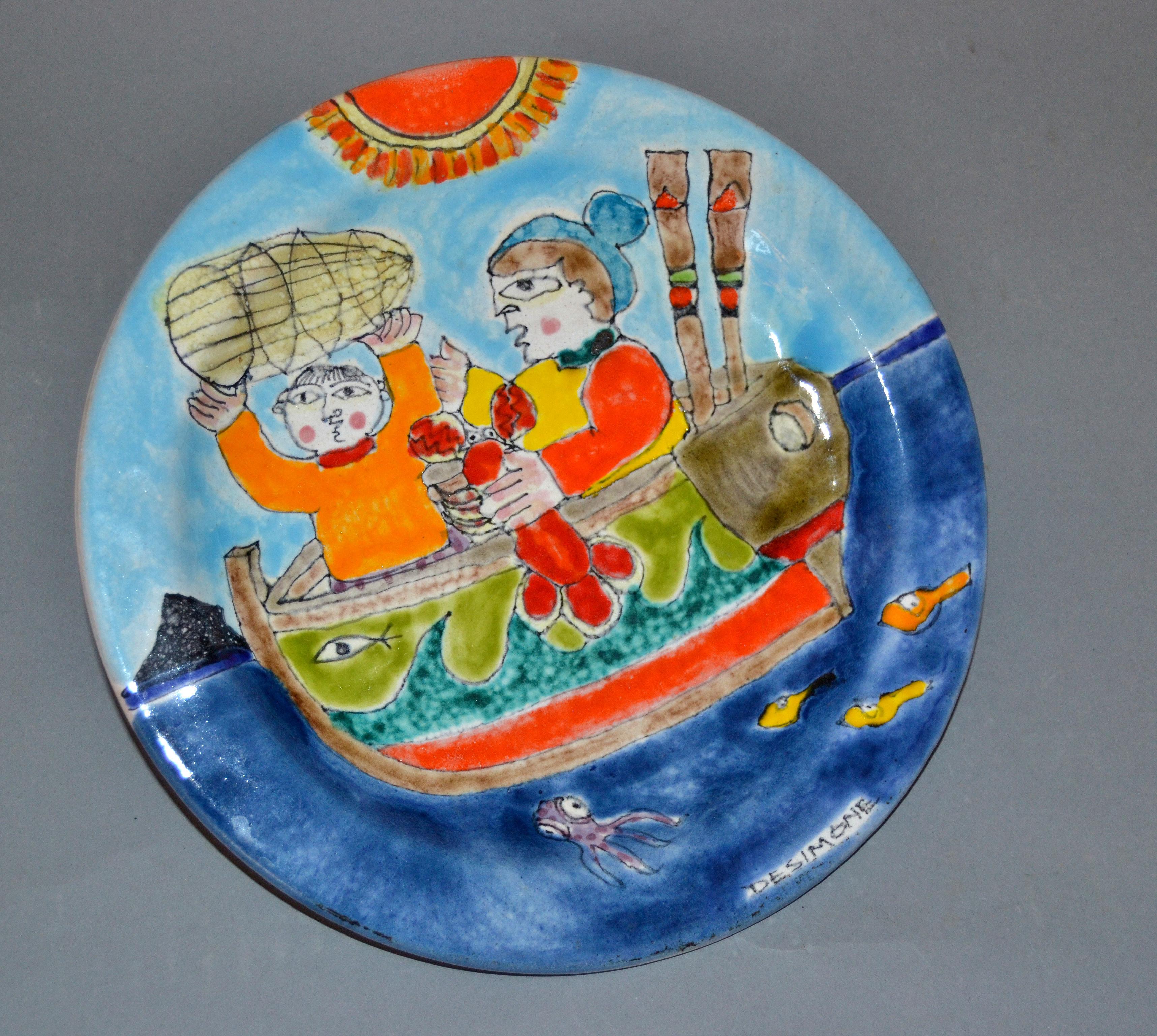 Original Italian Giovanni Desimone hand painted art pottery, round decor plate depicts a scene of fishermen lobster fishing with basket and octopus on a sunny day.
The plate is glazed and very colorful.
Makers Mark on the plate as well as marked