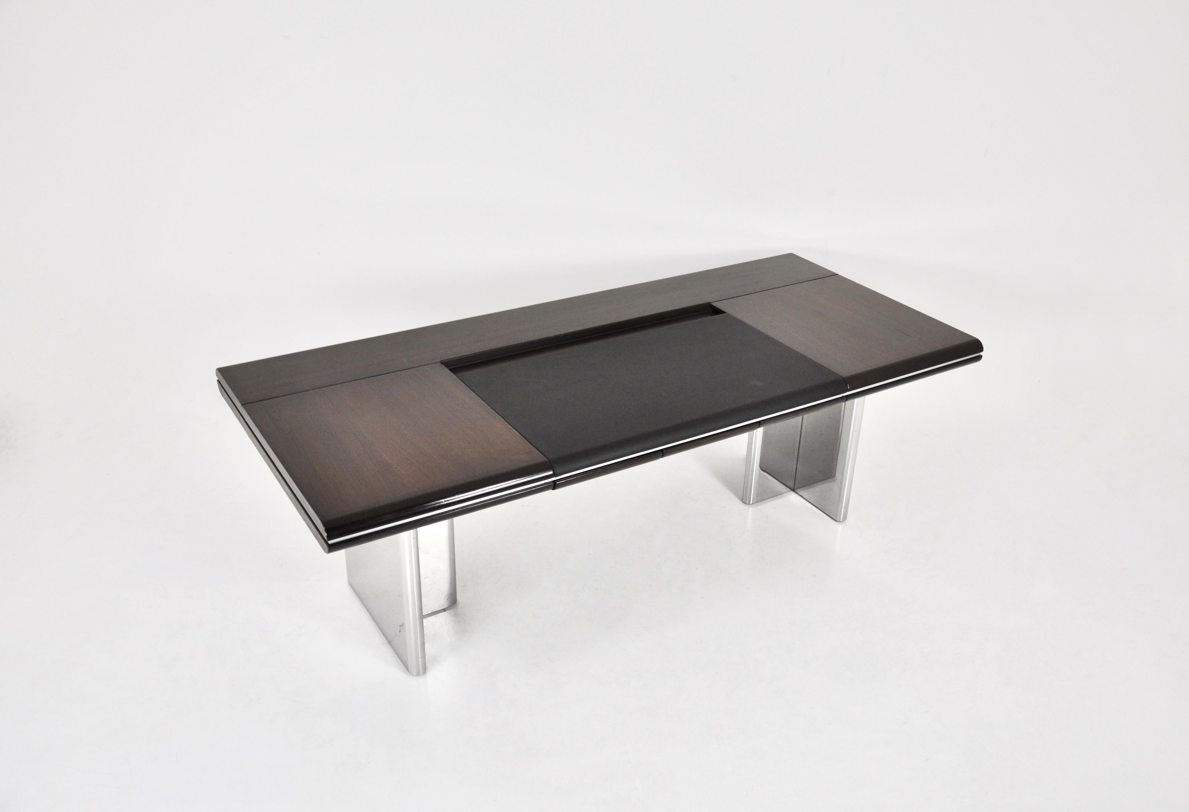 3-drawer desk with leather and wood top and chromed metal legs designed by Hans Von Klier in the 70s. Wear due to age and time of the desk.