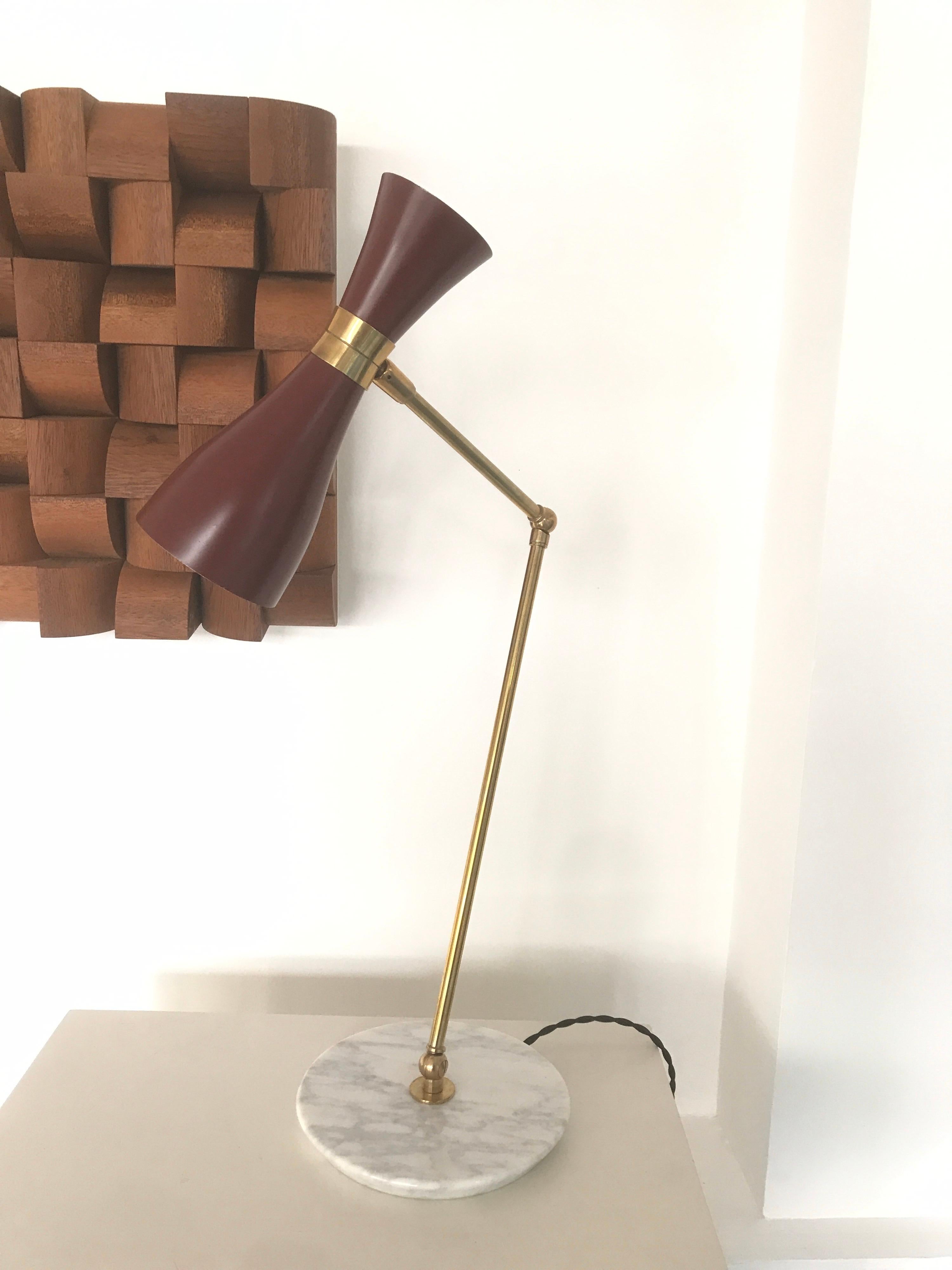 1970s Italian desk lamp.
White marble base with lacquered orientable metal shade
Rewired.