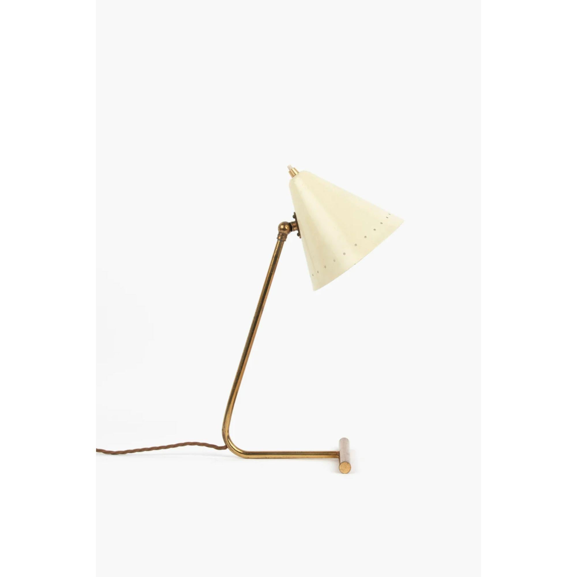 Italian desk lamp by Gilardi & Barzaghi, 1950s

Gilt tubular brass base and cream lacquered shade.

Dimensions: H 41cm x W 16cm x D 17.5cm
Condition: The original gilding has rubbed back to a wonderful patina and the shade has been re-finished