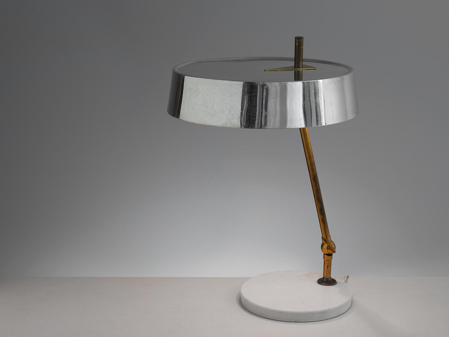 Desk lamp, marble, metal, brass, Italy, 1950s.

Stylish desk light with mirrored shade. The circular shade matches the brass stem and the base perfectly. The base is a white marble circle on which the brass stem stands. The stem can be adjusted in