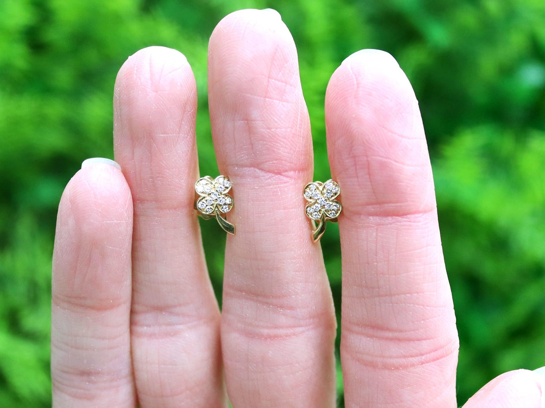 An impressive pair of vintage Italian 0.18 carat diamond and 18 karat yellow gold 'clover' stud earrings; part of our diverse vintage jewelry and estate jewelry collections.

These fine and impressive vintage diamond earrings have been crafted in