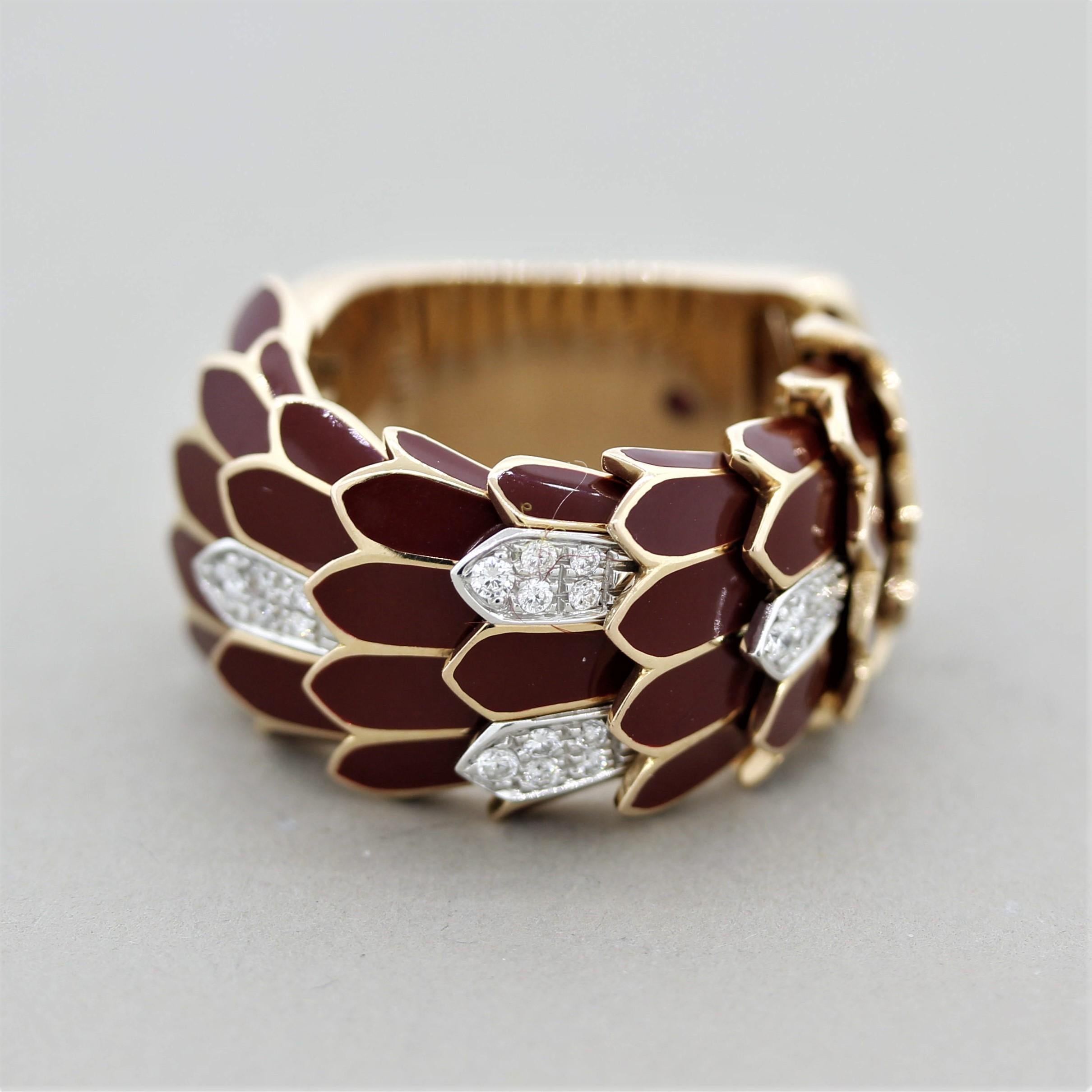 A chic and sexy Italian made ring. It features maroon-red enameling and 0.25 carats of round cut diamonds which are set over scales of a snake! Typical of a Bulgari design, this Italian made piece shows the quality of the Italian workmanship. Made