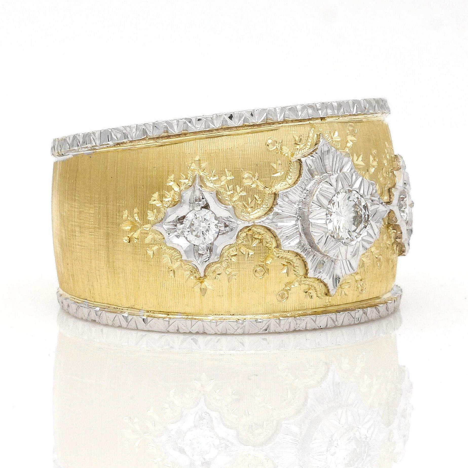 This Italian handcrafted diamond statement ring in 18k yellow gold is a magnificent piece of fine jewelry. It features a beautiful hand-engraved design, set with diamonds and signed with the Italian jewelry registry mark * 893 FI. A beautiful,