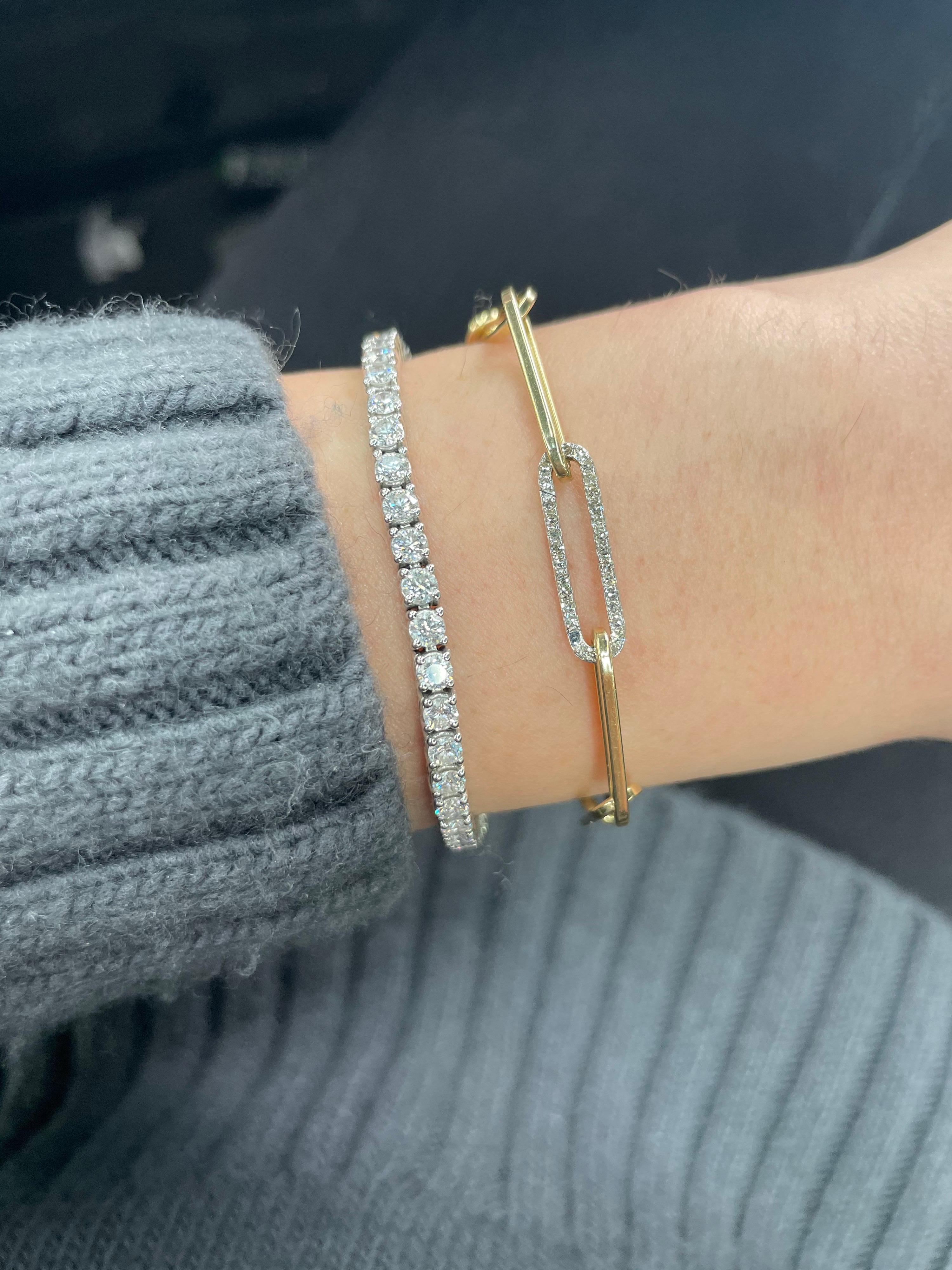 Trendy 14 karat yellow gold paperclip link bracelet featuring a diamond link clasp. Each gold link is 0.82 inches. Made in Italy. 
Great to stack!
More clasp available, email for more photos and different styles.
