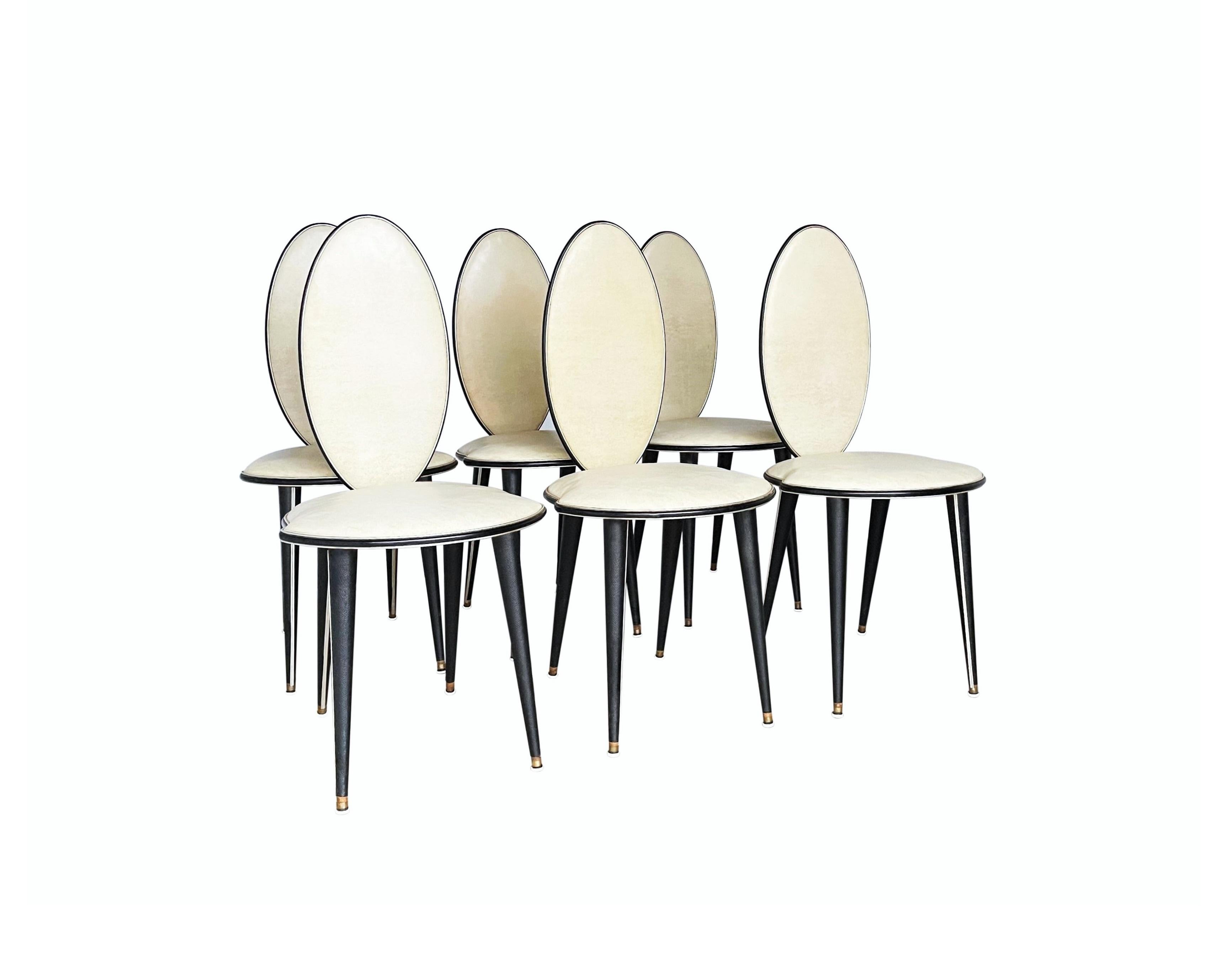 Diese atemberaubenden und höchst ungewöhnlichen Esszimmerstühle wurden 1952 von Umberto Mascagni aus Bologna, Italien, entworfen. I. Barget, Ltd. in London (