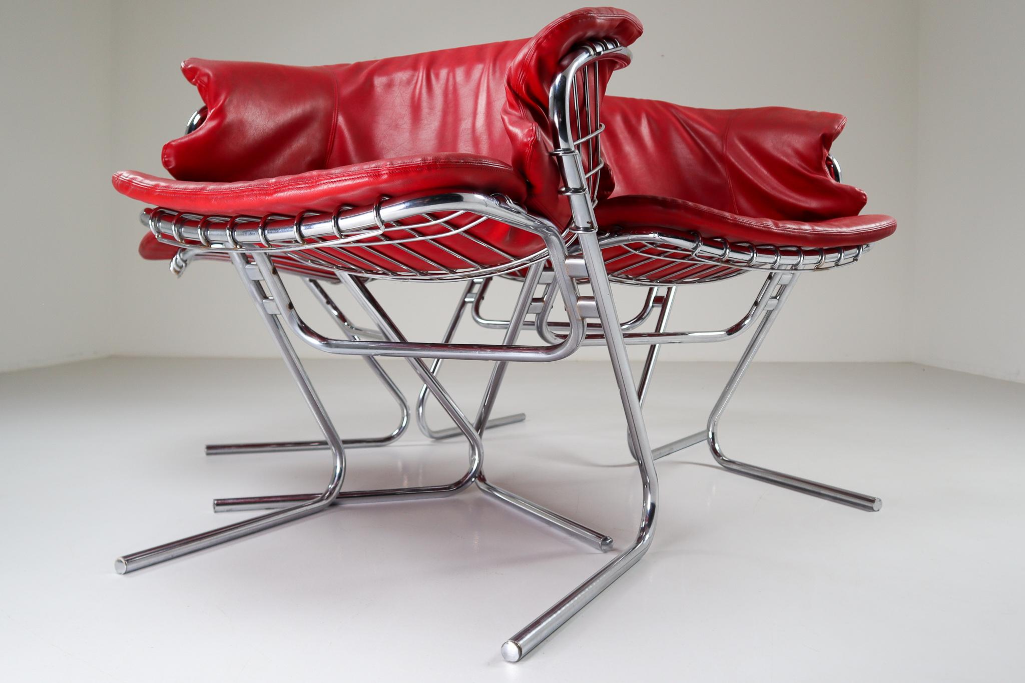 Set of four Italian dining chair designed by Gastone Rinaldi for RIMA, 1970s
Curved chrome steel chair, with seat and backrest covered in a red leather, original of the 1970s. Produced by the RIMA Company, in Padova, and designed by Gastone