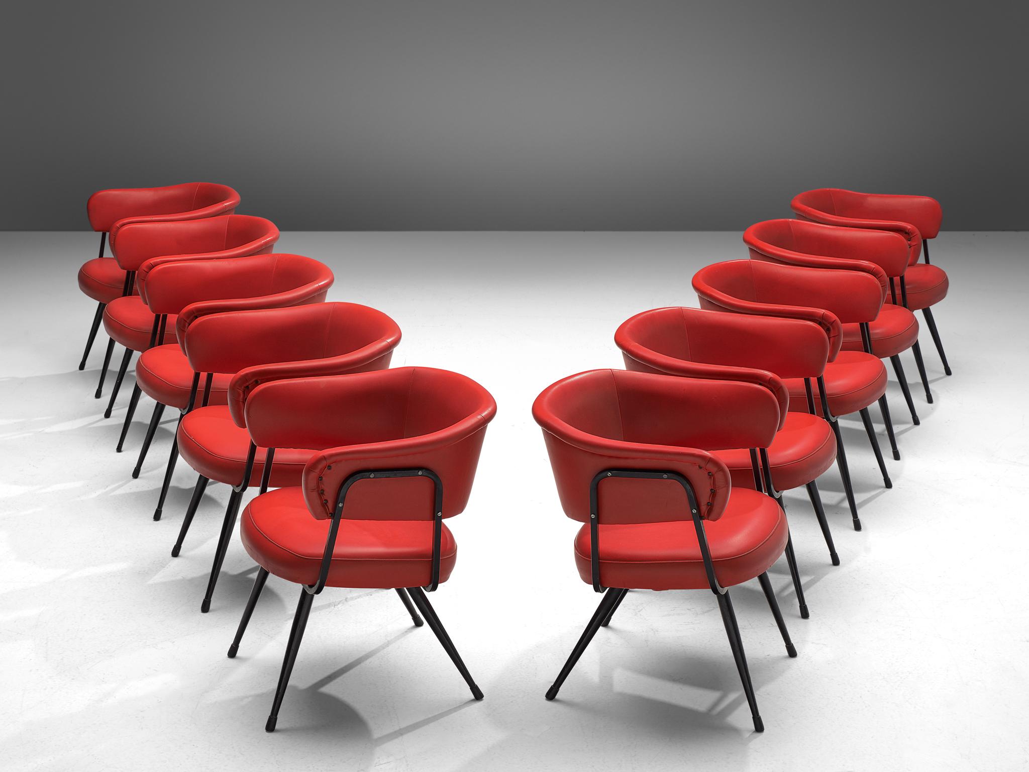 Dining chairs, leatherette and metal, Italy, 1970s

This set of dining chairs features a red seat combined with a black lacquered steel frame. The backrests are curved and surround the sitter, creating a comfortable and embracing feeling. The black