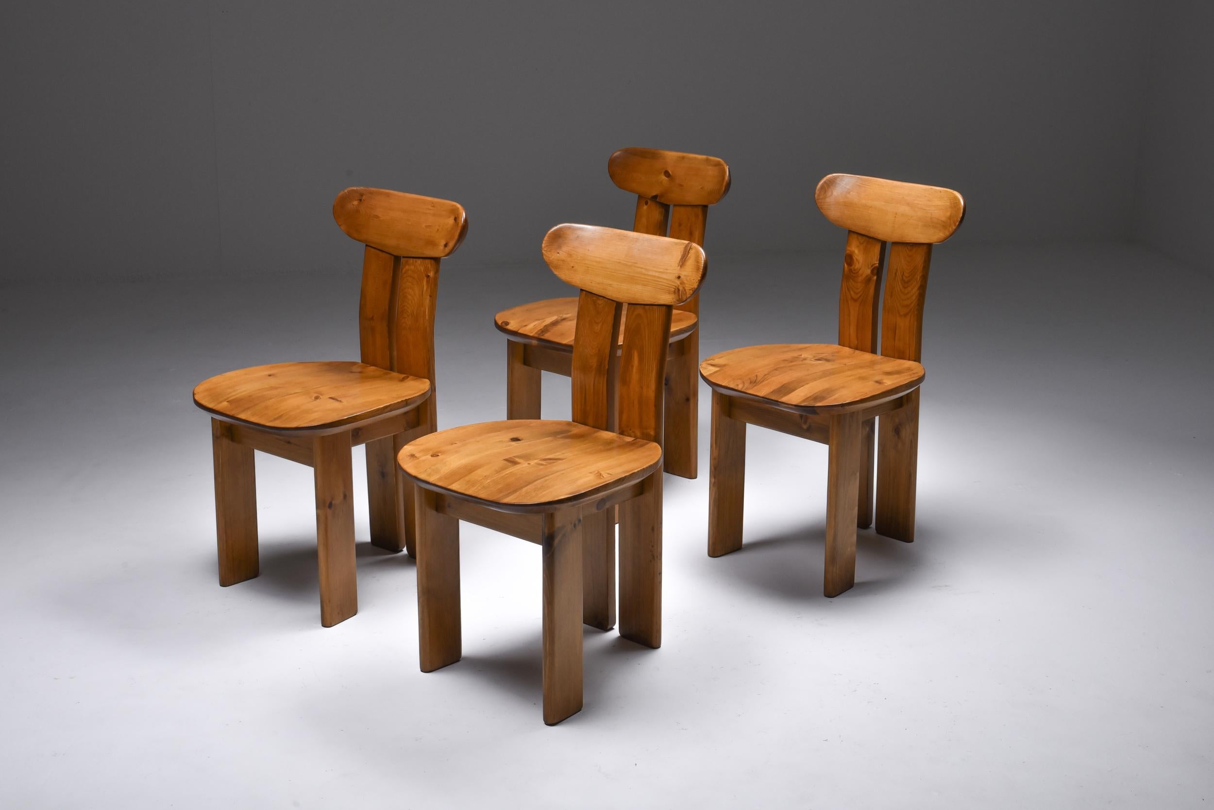 Italian design, dining chairs, Mobilgirgi, Mario Marenco, pinus, 1970s

Set of four dining chairs reminiscing of Afra and Tobia Scarpa's africa chairs from the artona series.
But in a more toned down and rustic version.
 