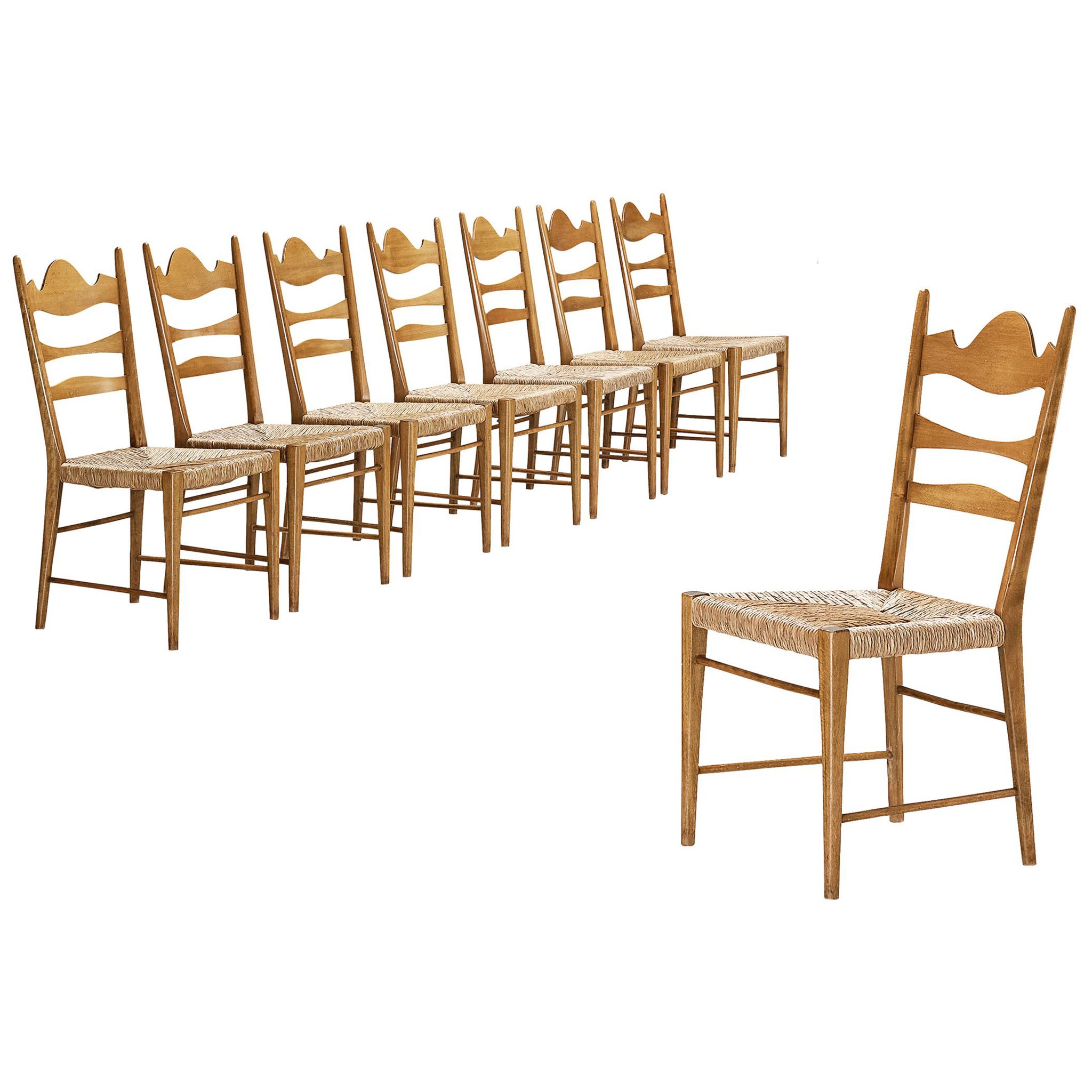 Italian Dining Chairs with Carved Backs and Straw Seats For Sale