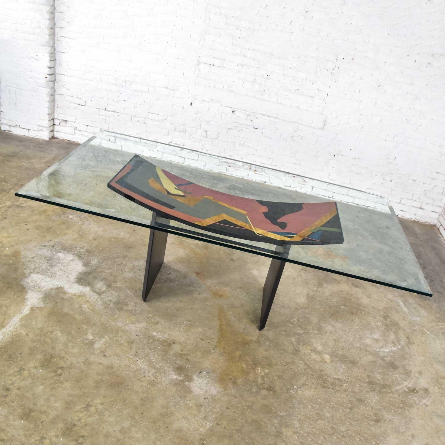 Magnificent Italian Postmodern style dining table signed by Pietro Costantini. Comprised of a concave curved rectangle base on two straight panels. Highly black lacquered on the legs and one side of the base top and the top side has a veneer inlay