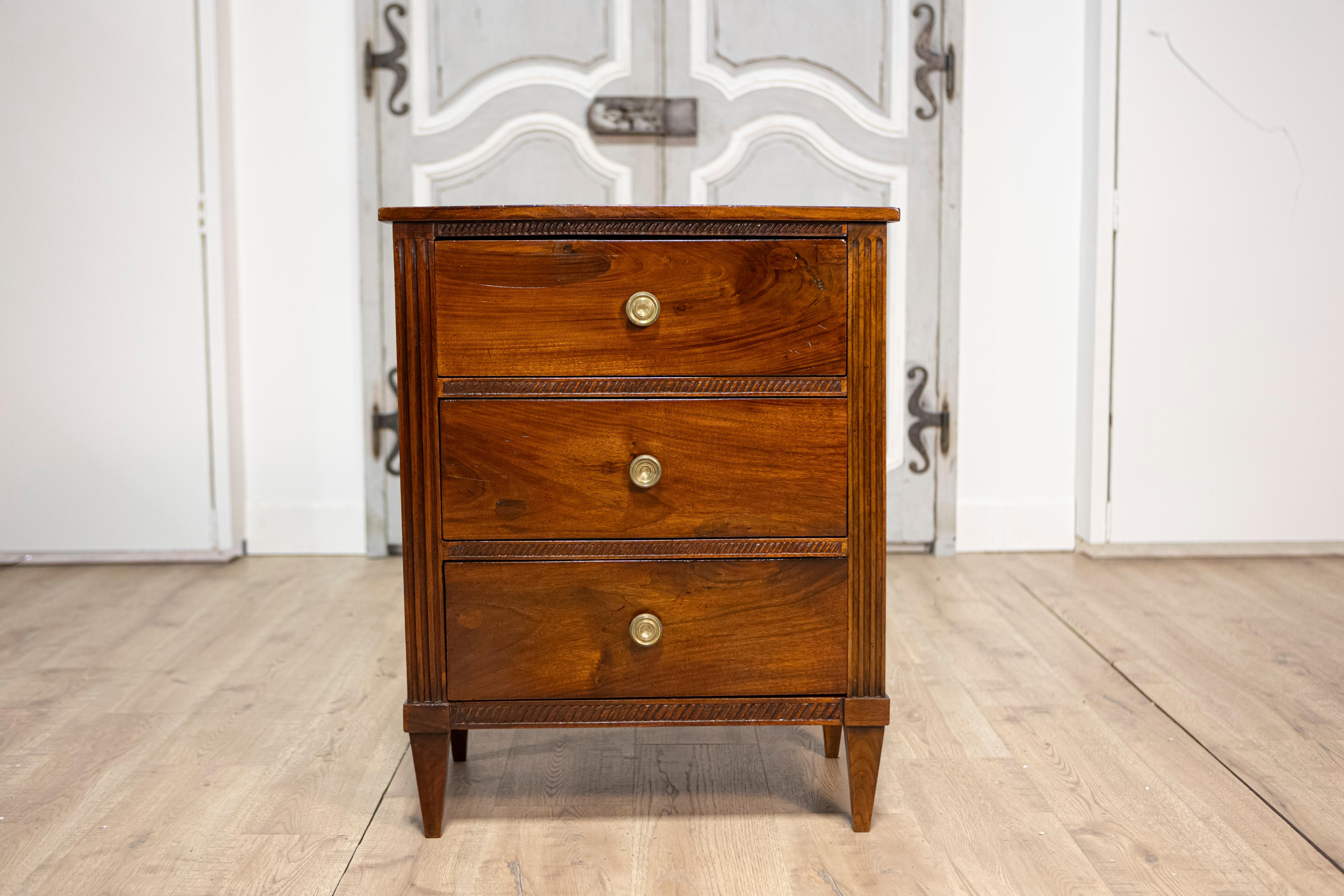 Carved Italian Directoire Period Late 18th Century Three Drawer Walnut Bedside Chest For Sale