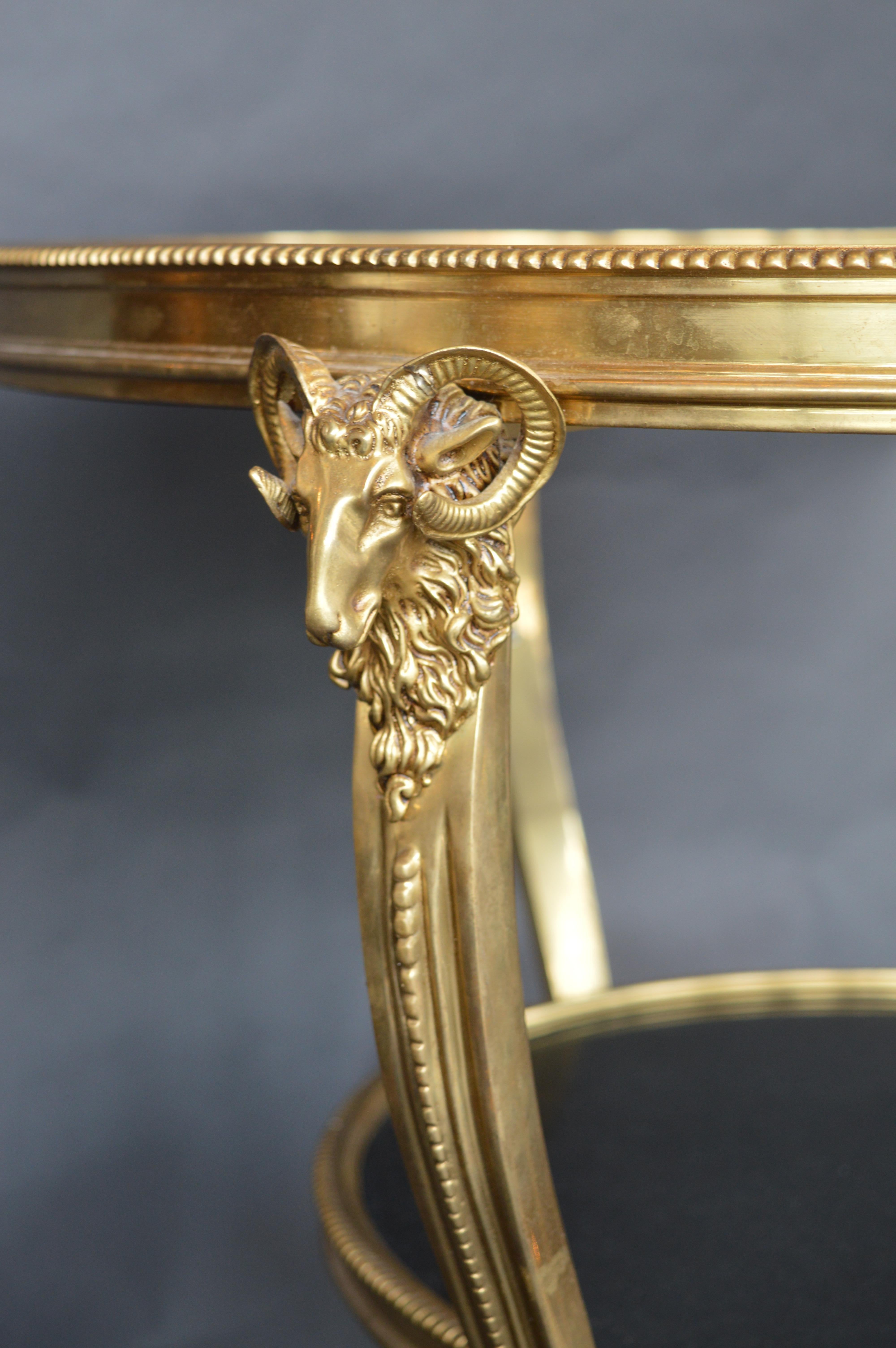 Early 1900s Gueridon table in bronze mounted with rams heads.