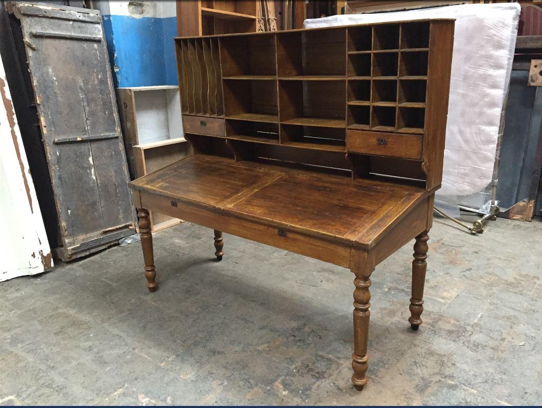 Italian double wooden desk with pigeonholes from 19th century,
the writing top could be lift to access the containment.
Measures: Total height cm.157.
 