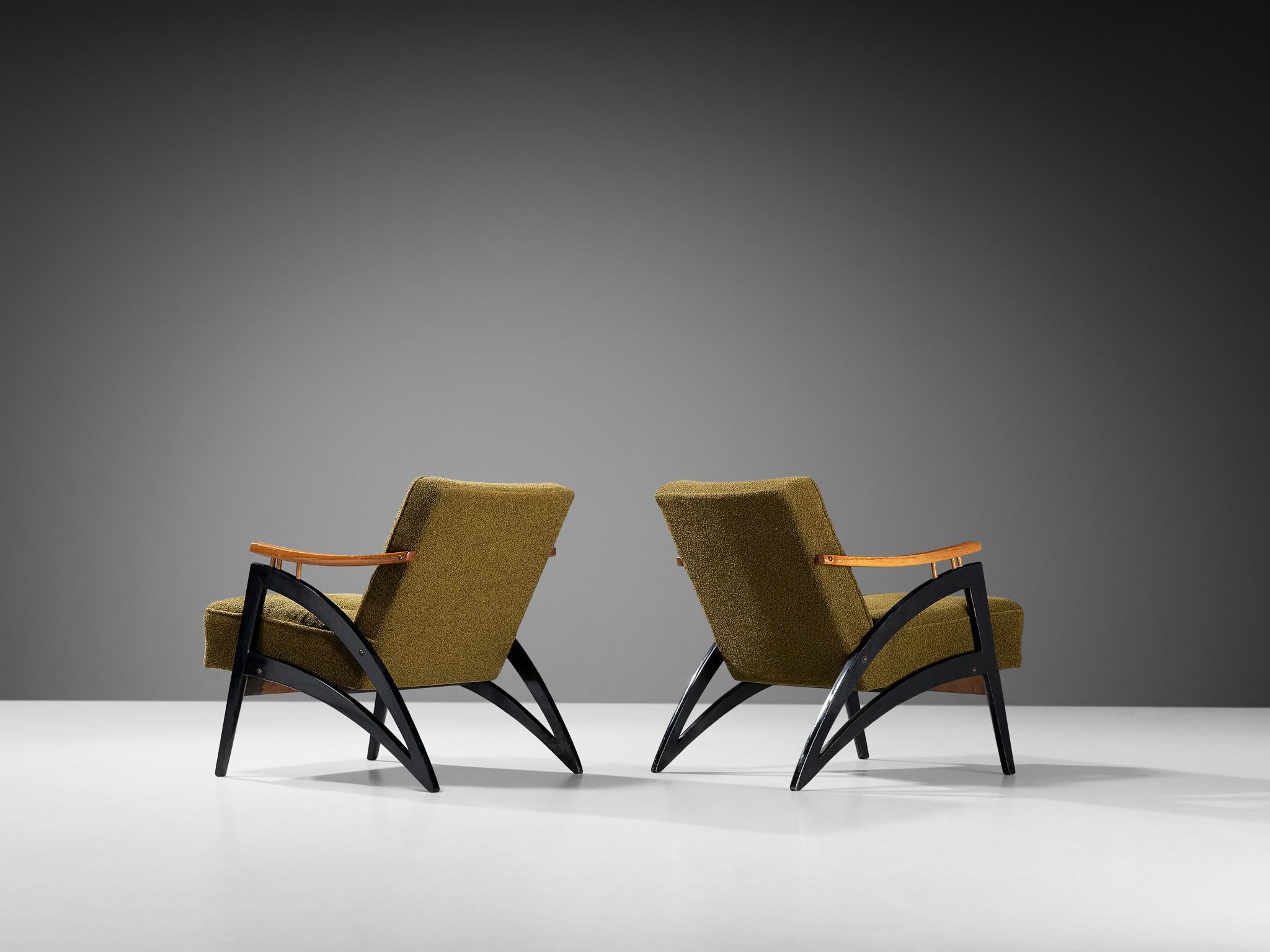 Lounge chairs, birch, lacquered wood, fabric, Italy, 1960s.

Well-shaped Italian lounge chairs in an olive green upholstery. The lower part of the legs are in a sharp V shape and executed in black lacquered wood. The armrests are made from birch