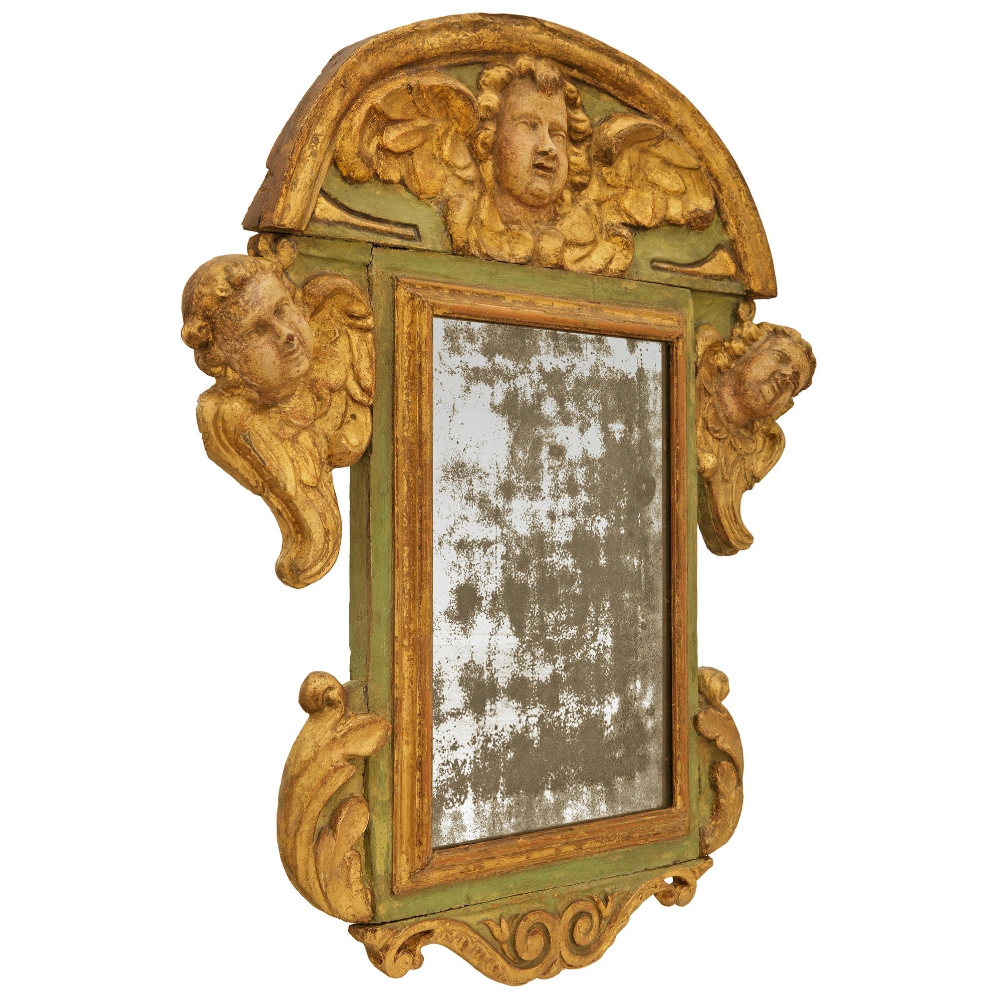 Italian early 18th century Baroque Period patinated Wood and Giltwood mirror In Good Condition For Sale In West Palm Beach, FL