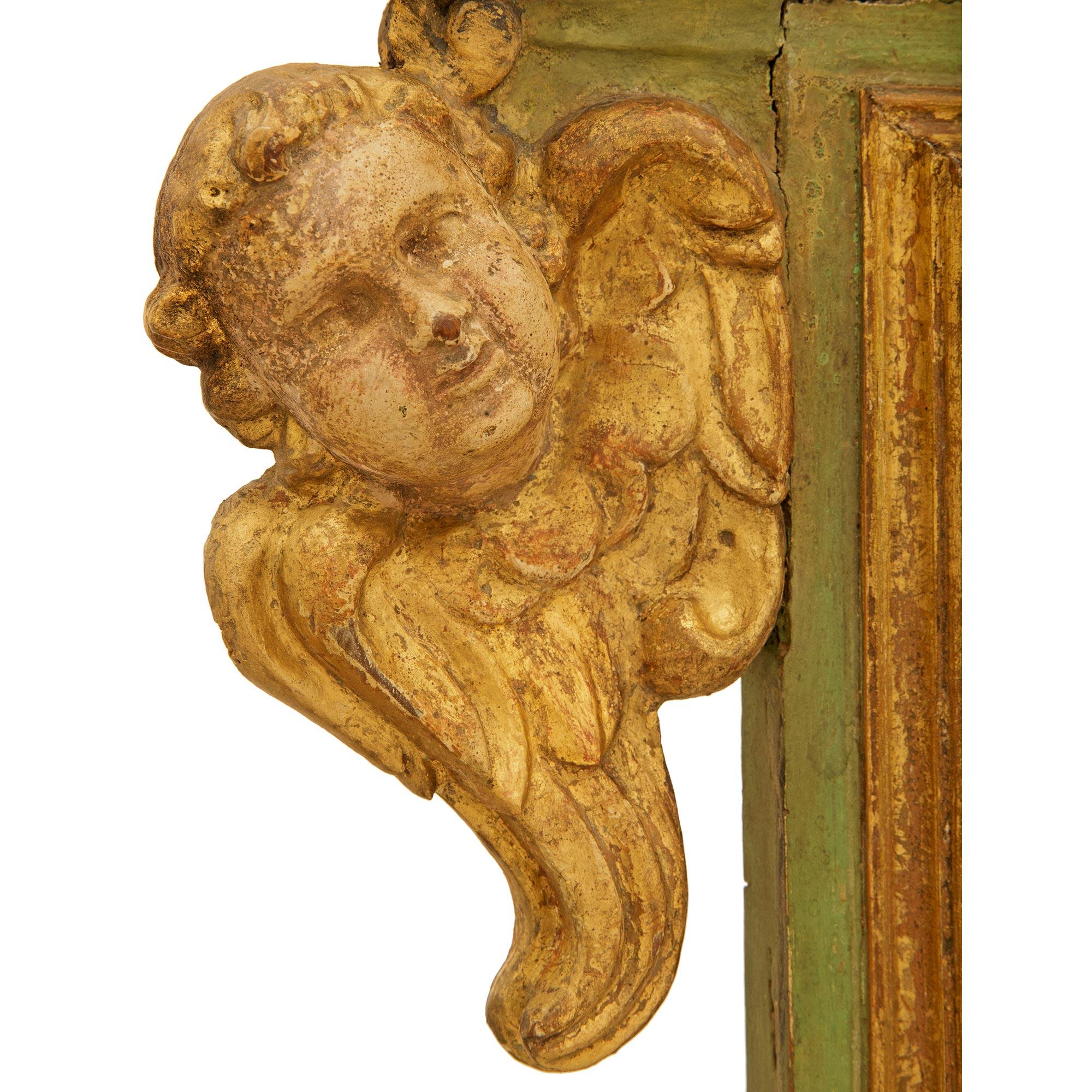 Italian early 18th century Baroque Period patinated Wood and Giltwood mirror For Sale 1