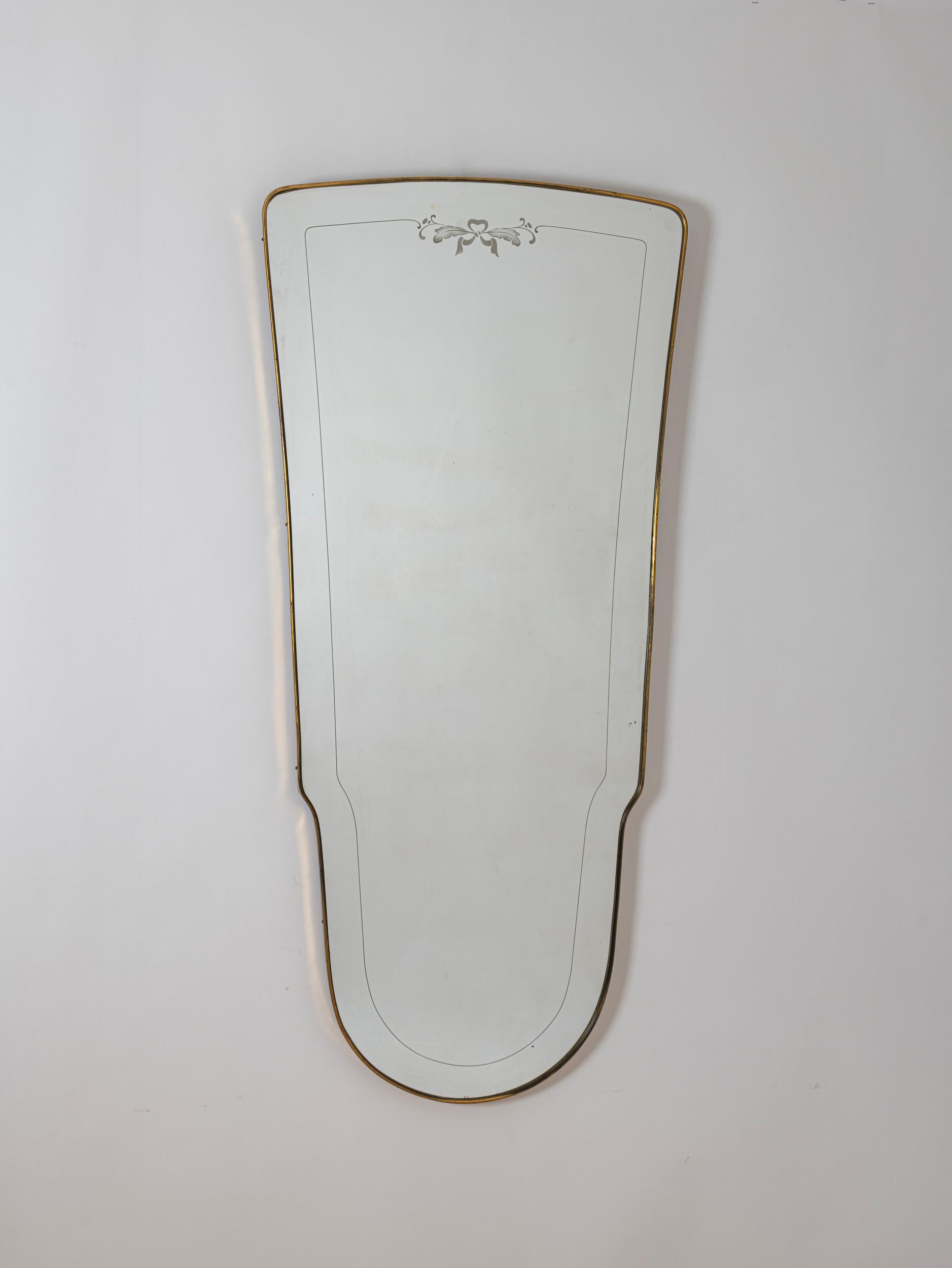Unusual brass frame mirror with decorative etching in the mirror.

Italy early 1950s

(A8)