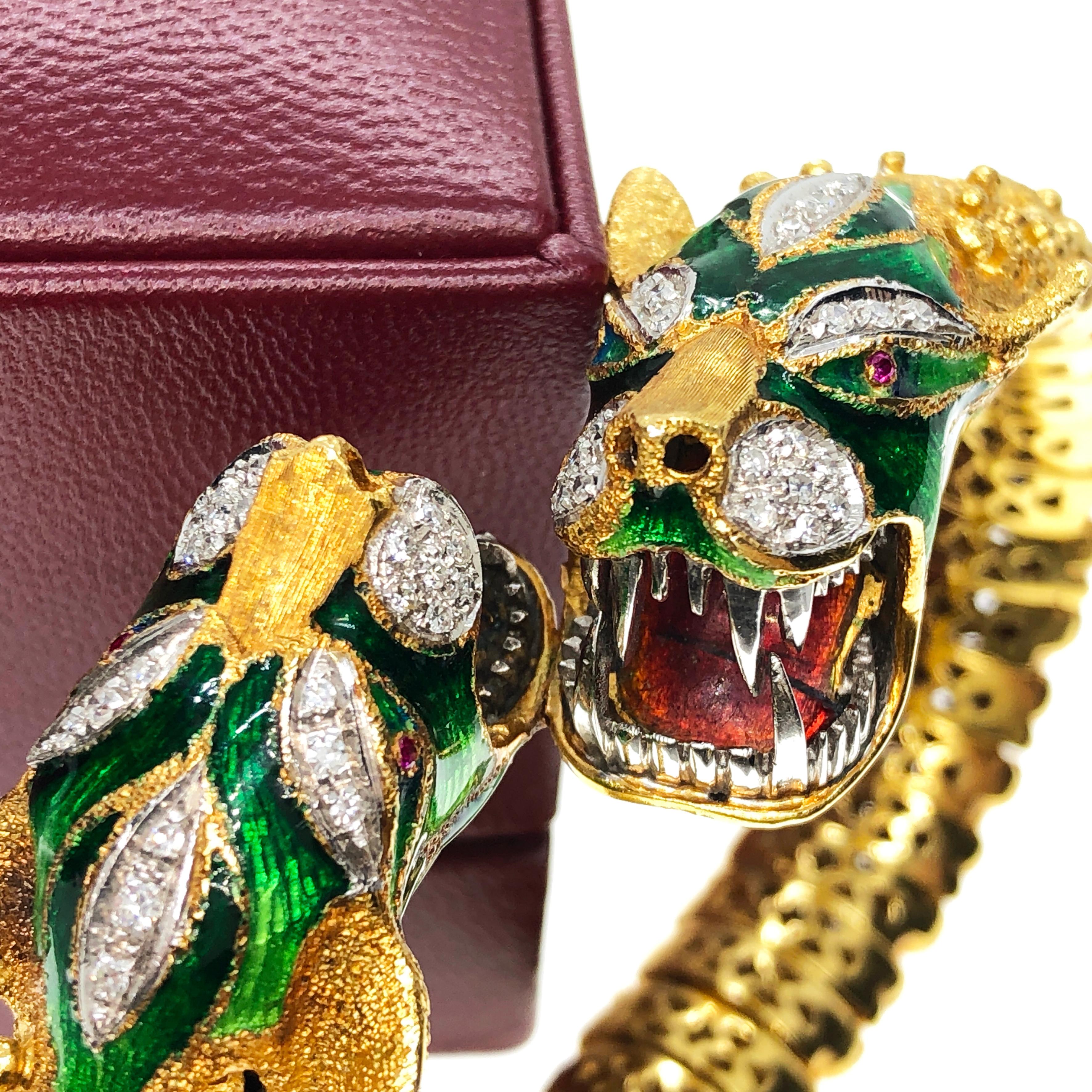 One-of-a-kind, Awesome, Dragon Head Shaped Snake Bangle Bracelet, in a Typical Sixties Italian Style, the so-called Bestiario. The two drangons set in white diamond and ruby are beautifully hand enamelled; the details of the red enamelled tongue and