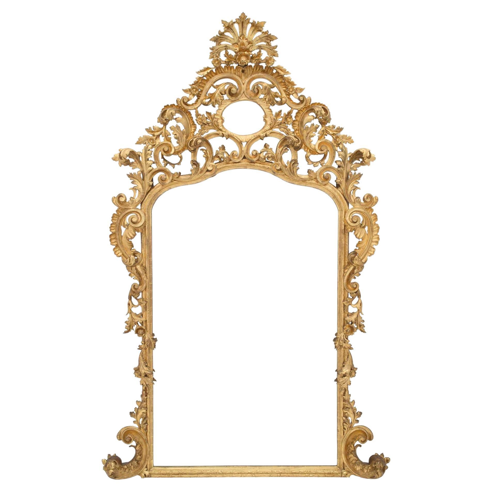 Miroir italien baroque en bois doré du début du XIXe siècle