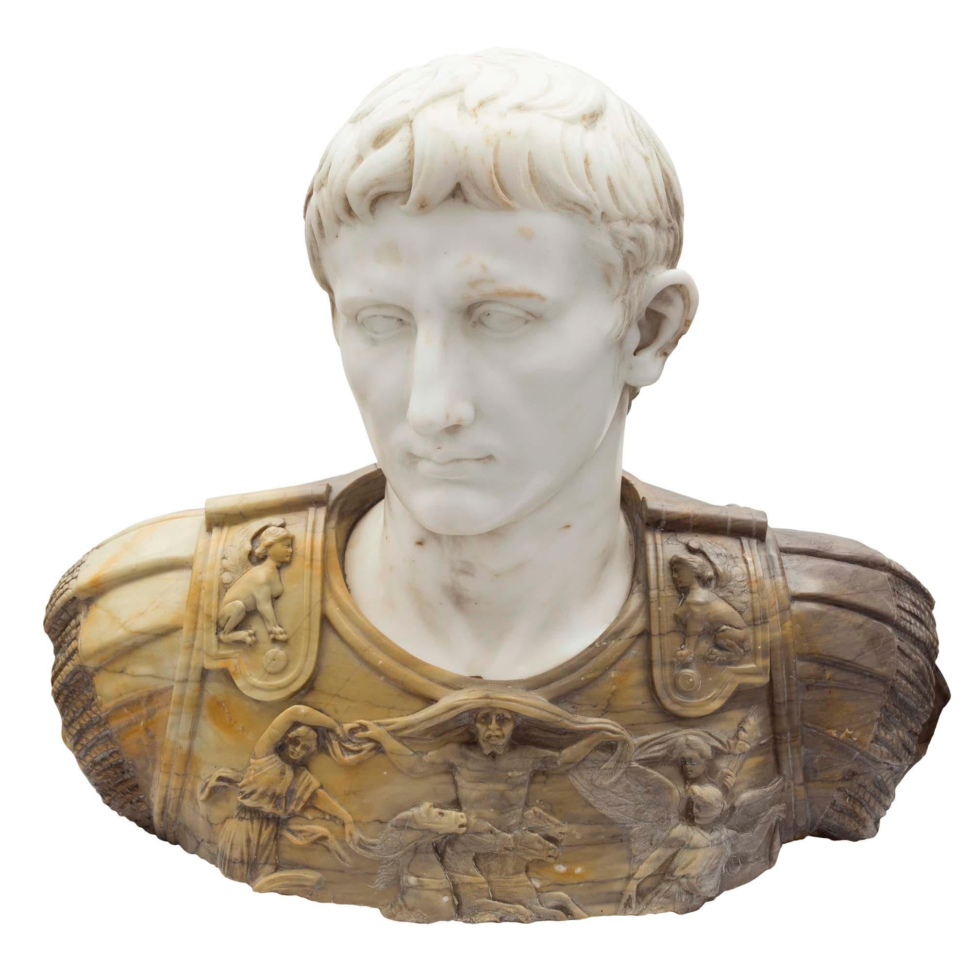 A handsome and extremely high quality Italian early 19th century white Carrara marble and Siena marble bust of Augustus of Prima Porta. The wonderfully detailed Augustus of Prima Porta displays a richly carved Siena marble armor with wonderful