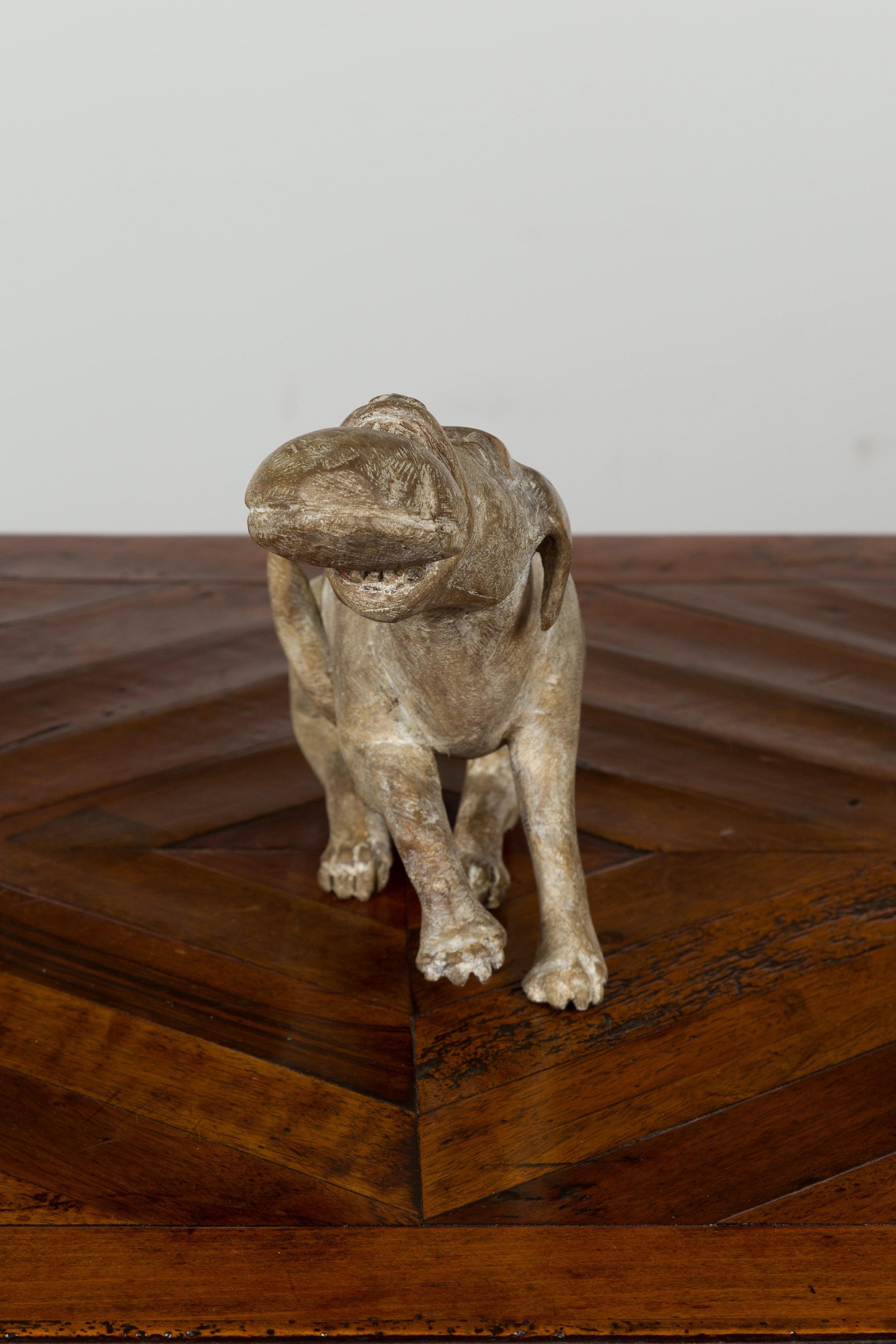 Italian Early 19th Century Carved Wooden Dog Playing with a Toy 9
