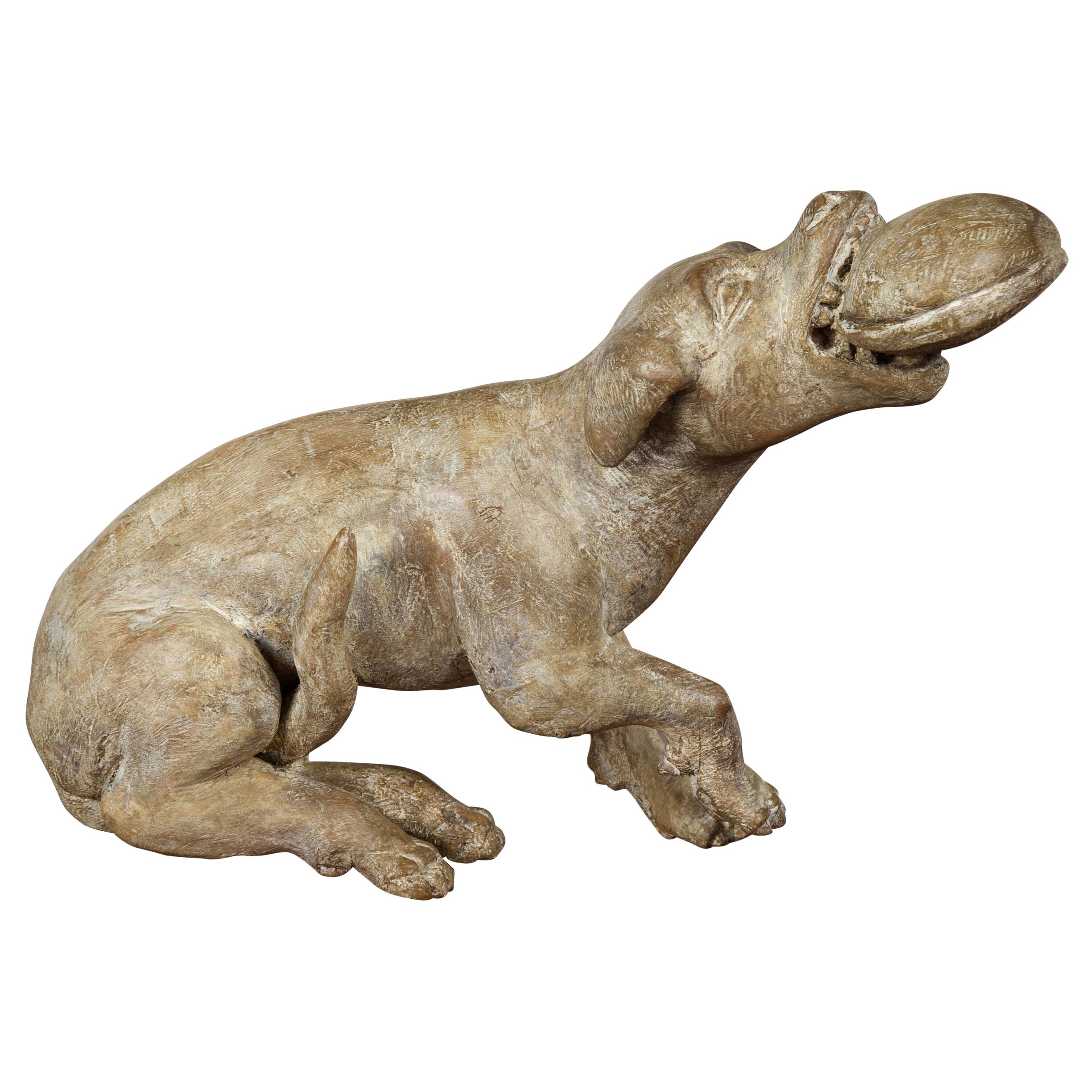 Italian Early 19th Century Carved Wooden Dog Playing with a Toy