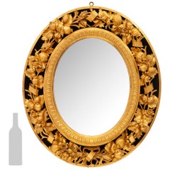Italian early 19th century Giltwood and black Velvet mirror