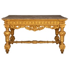 Table de centre en bois doré et marbre gris italien du début du 19e siècle de style Louis XIV
