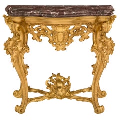 Console italienne du début du XIXe siècle de style Louis XV en bois doré et marbre