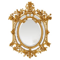 Miroir italien du début du 19ème siècle en bois doré de style Louis XV