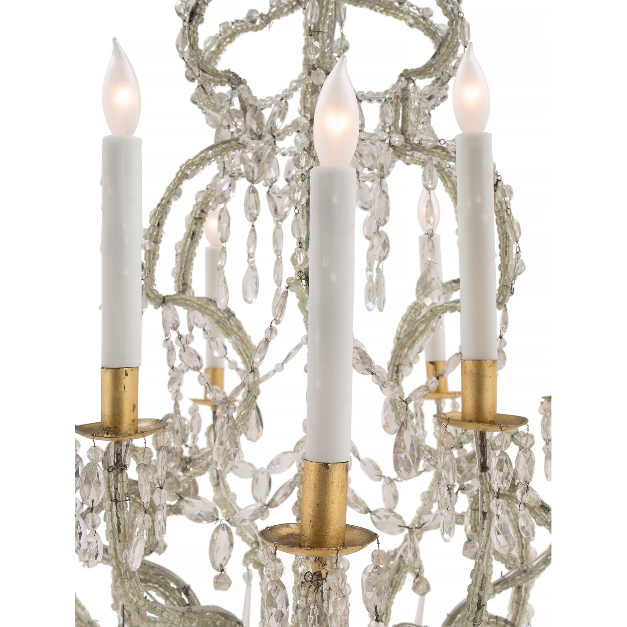 Metal Italian Early 19th Century Louis XV Style Iron, Gilt and Crystal Chandelier For Sale