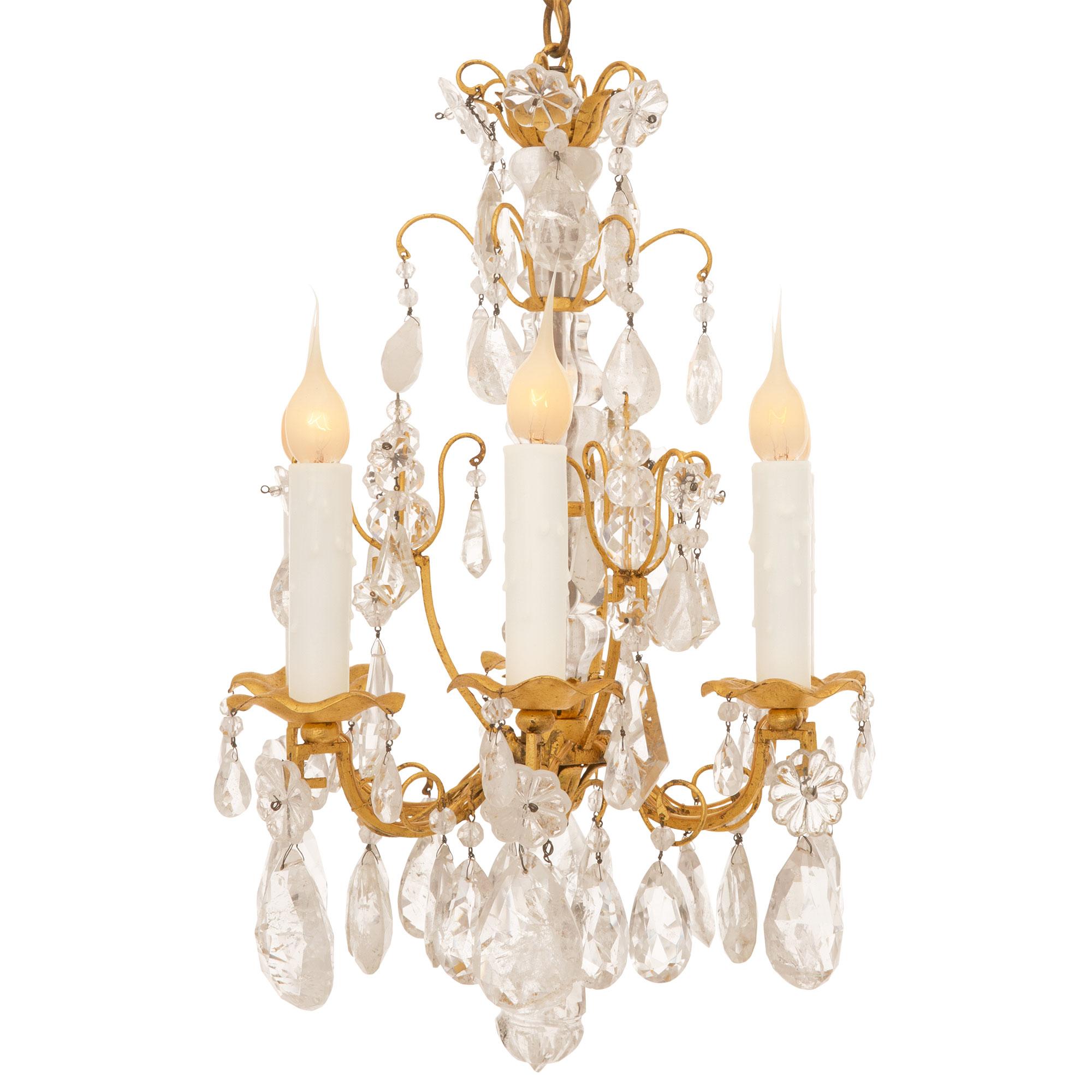 Italian Early 19th Century Louis XVI St. Gilt Metal And Rock Crystal Chandelier In Good Condition For Sale In West Palm Beach, FL