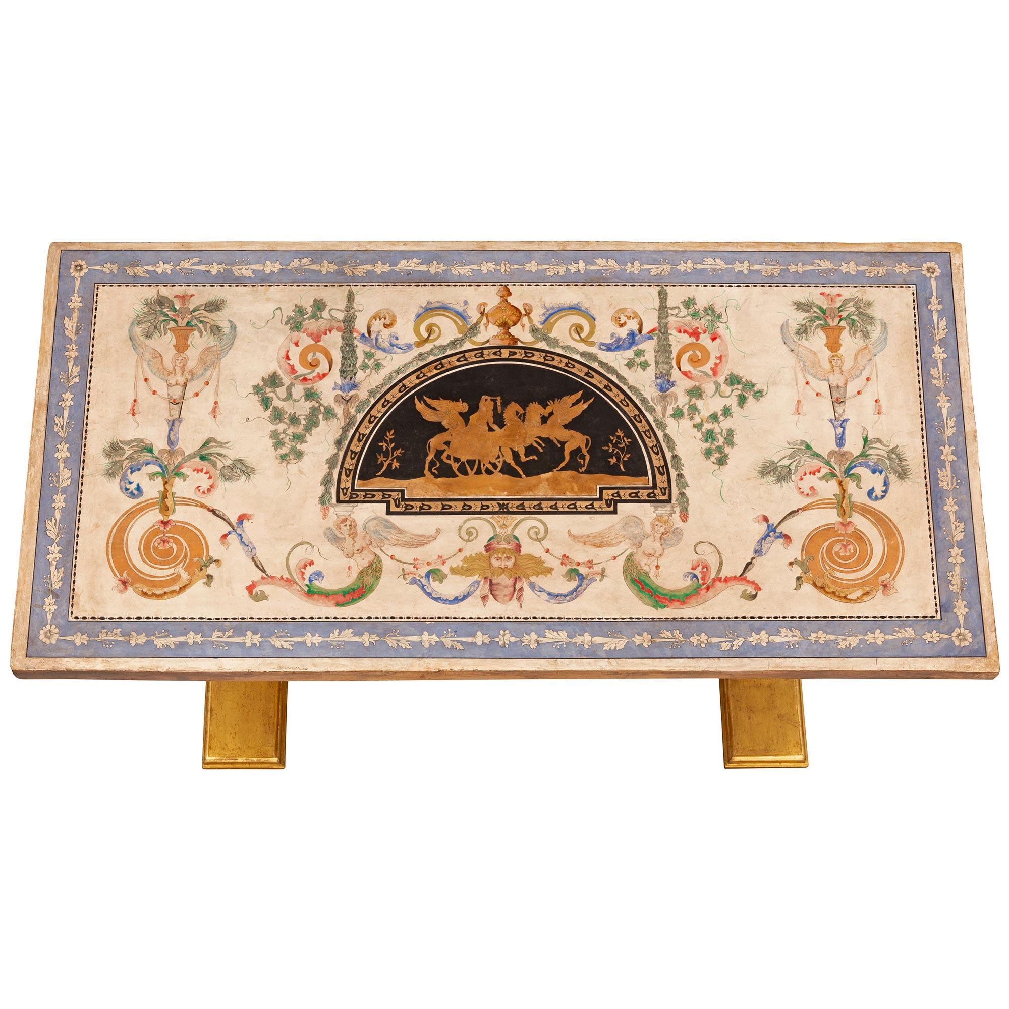 A stunning Italian early 19th century Neo Classical st. giltwood and Scagliola cocktail or coffee table. The rectangular table is raised by a fine H shaped support with a lovely mottled border. The impressive supports at each side display handsome