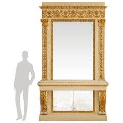Italian early 19th century patinated and Giltwood mirror and console