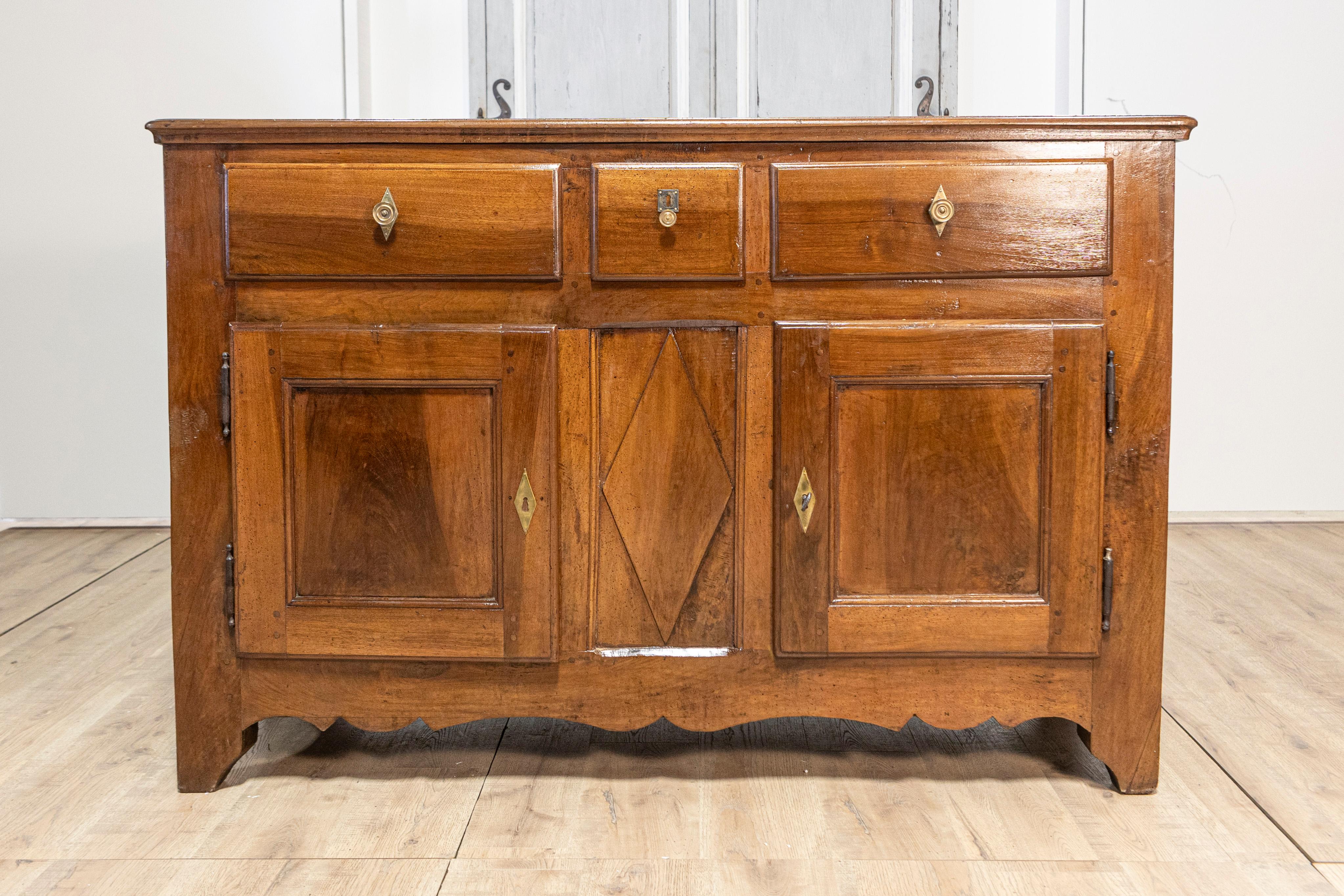 Carved Italian Early 19th Century Walnut Three Drawers over Two Doors Buffet For Sale