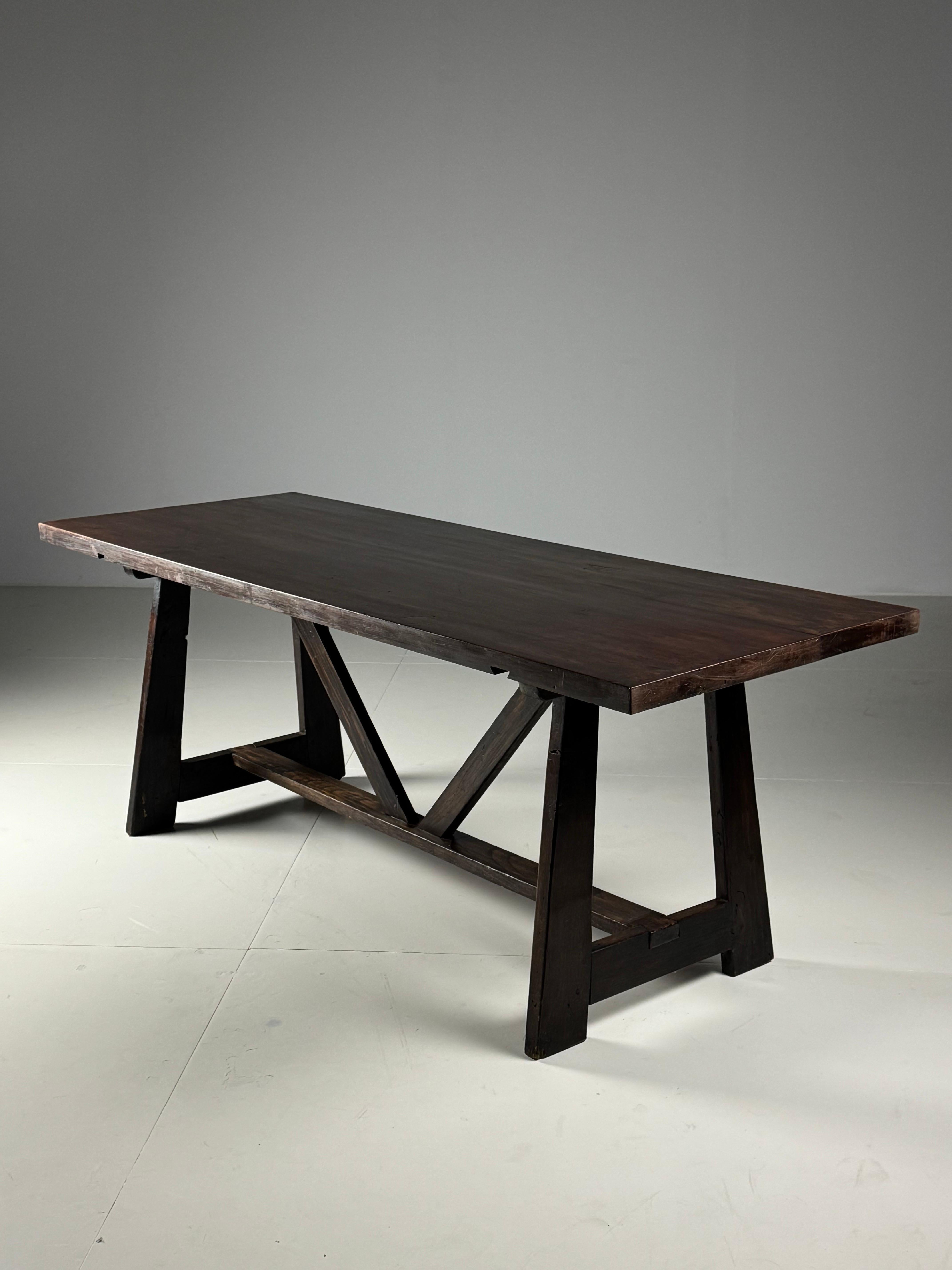 Italian dining table / monastery table.
Made of walnut.
Early 20th century.
In good condition! Sturdy and solid. Light signs of wear consistent with age.

Dimensions: 210L x 77W x 78H
72bh