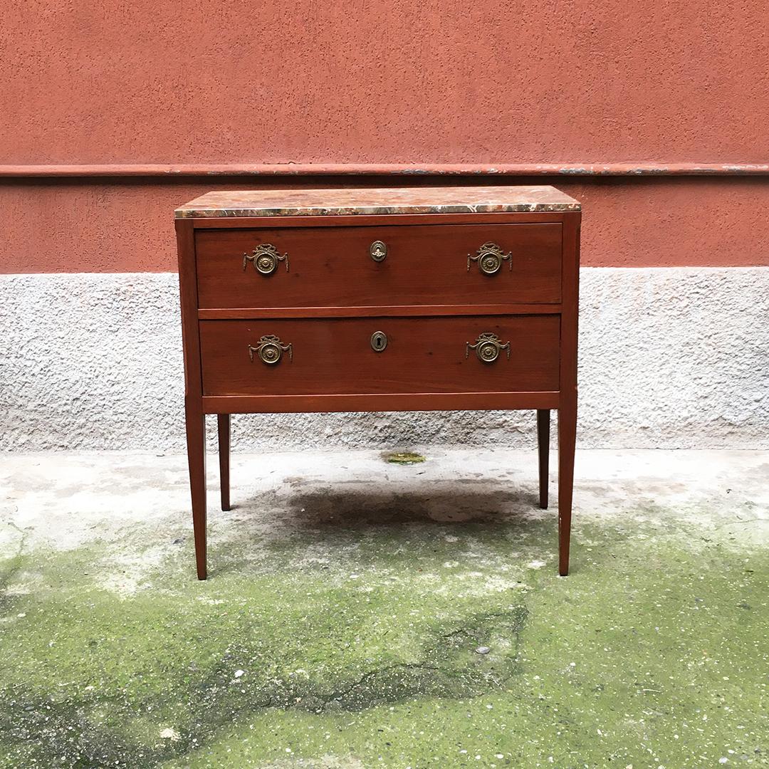 Italian early 20th century wooden chest of drawers with marble top, 1900s
Chest of drawers with wooden structure and marble top, with key and brass decorations on the front.

Very good condition.

Measurements 92 x 47 x 90 H cm.