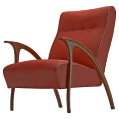 Fauteuil italien en noyer et simili-cuir rouge 