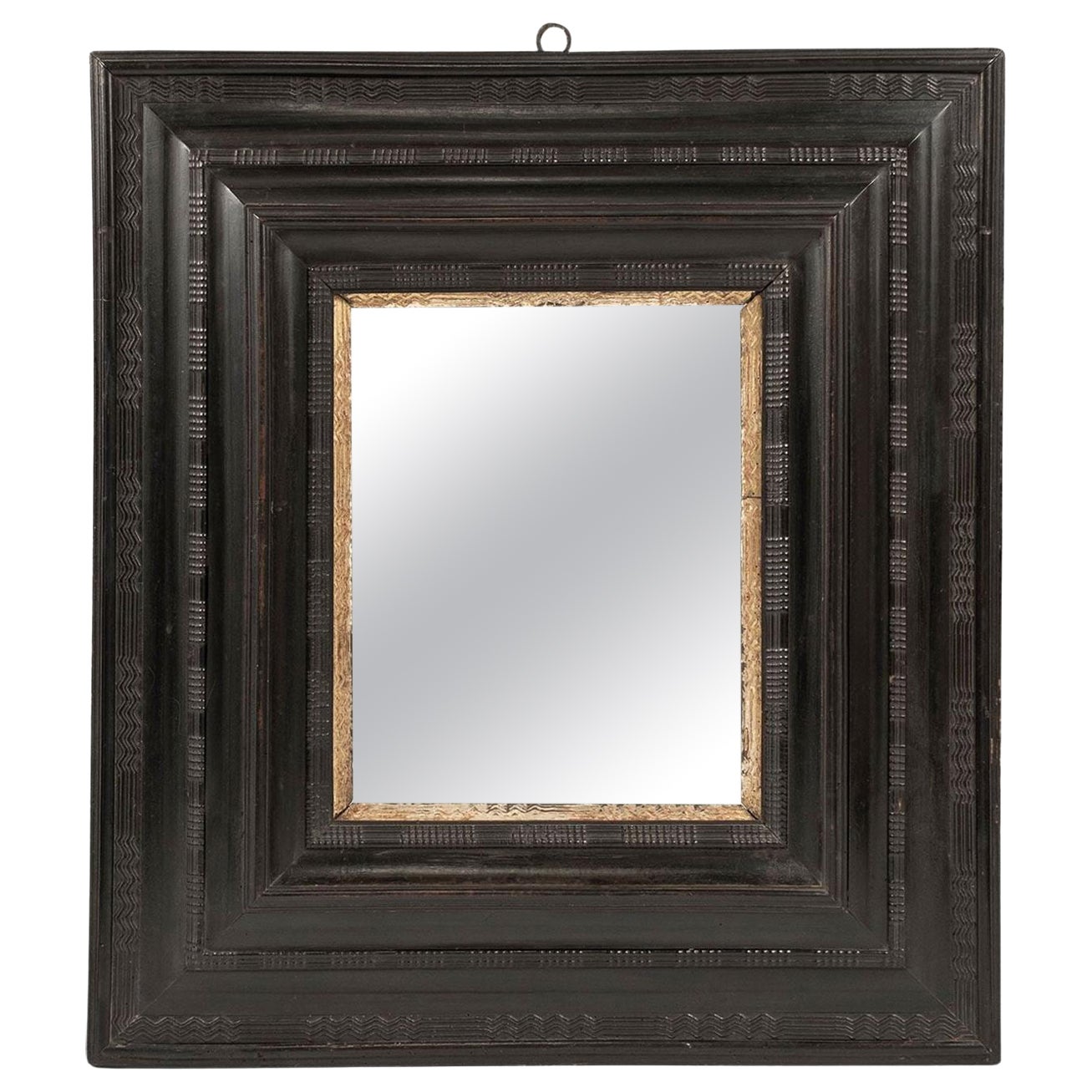 Specchio italiano in legno dorato e ebanizzato