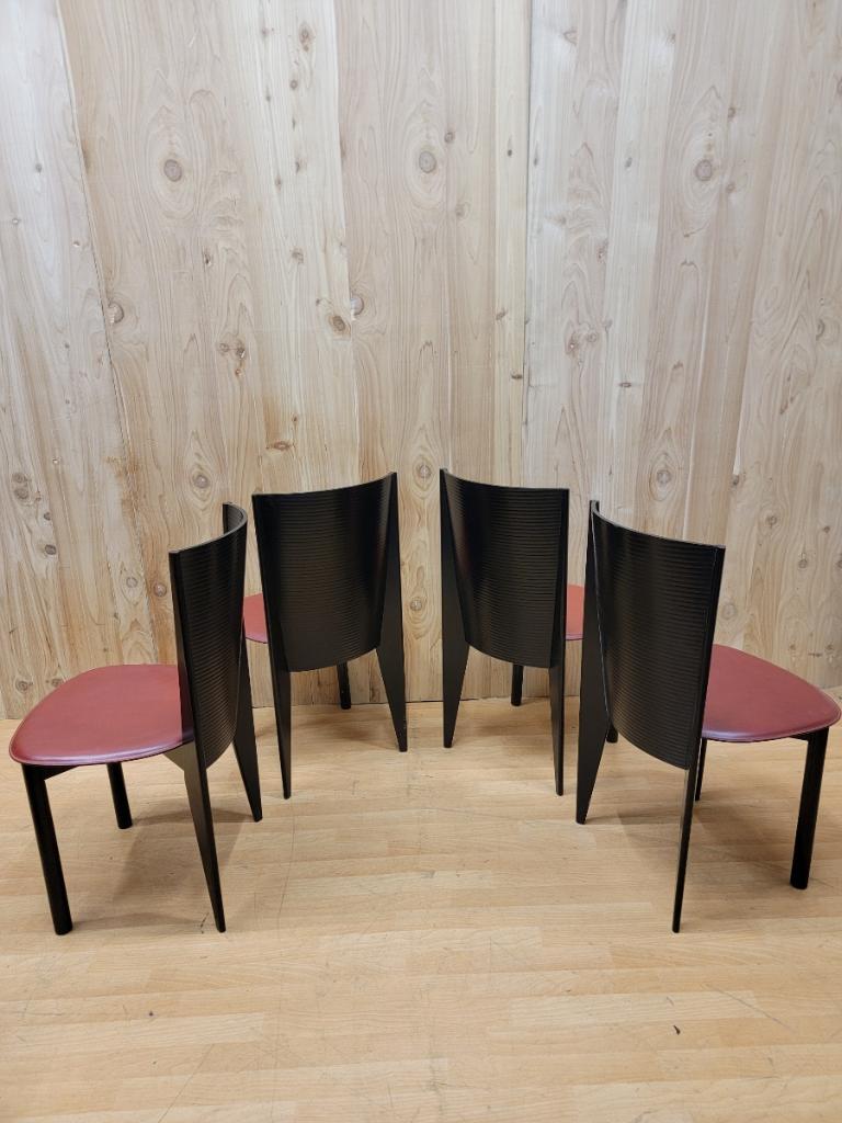 Vintage Post Modern Italian ebonized bentwood & leather dining chairs by Calligaris - set of 6

Stunning set of 6 Post-Modern Italian dining chairs produced by Calligaris in the 1980s. These chairs feature a black sculptural lacquered wooden frame
