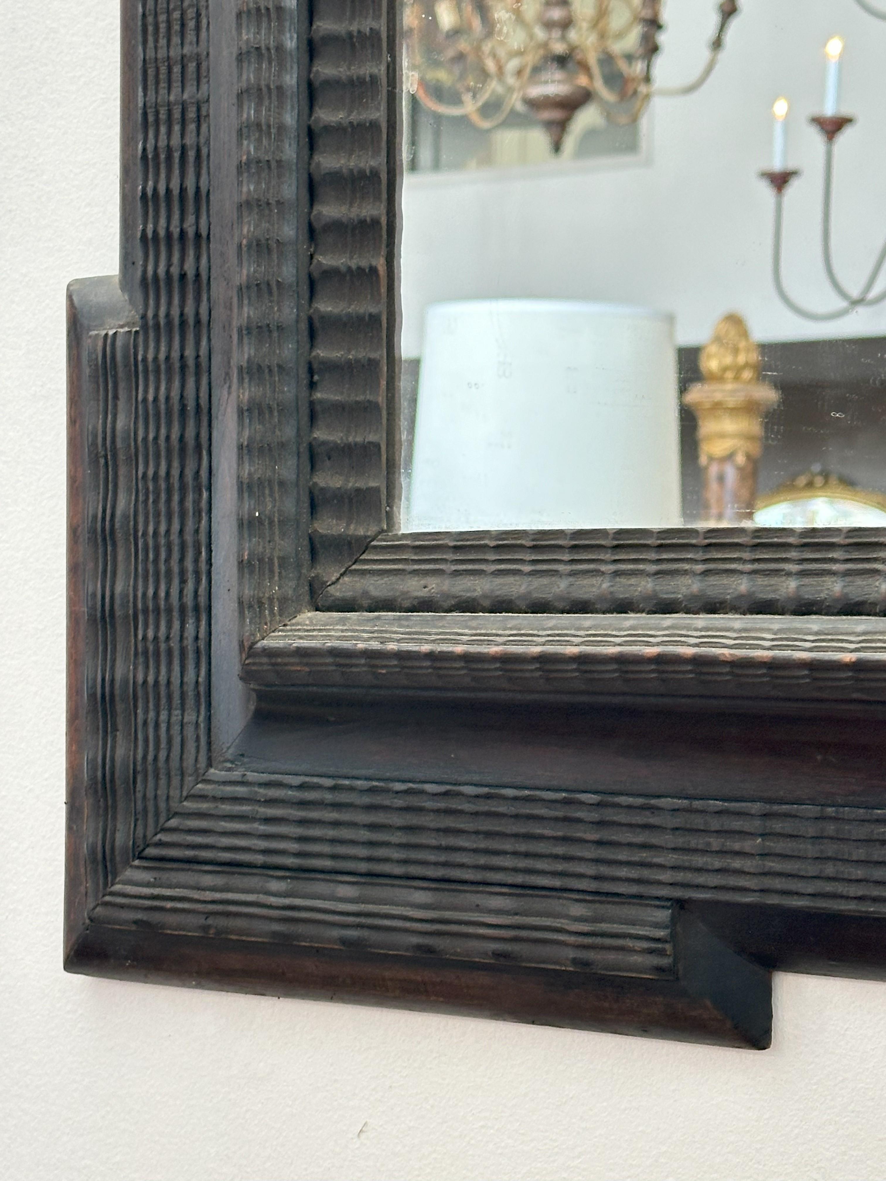 Rectangular plate with outstepped corners within molded borders.