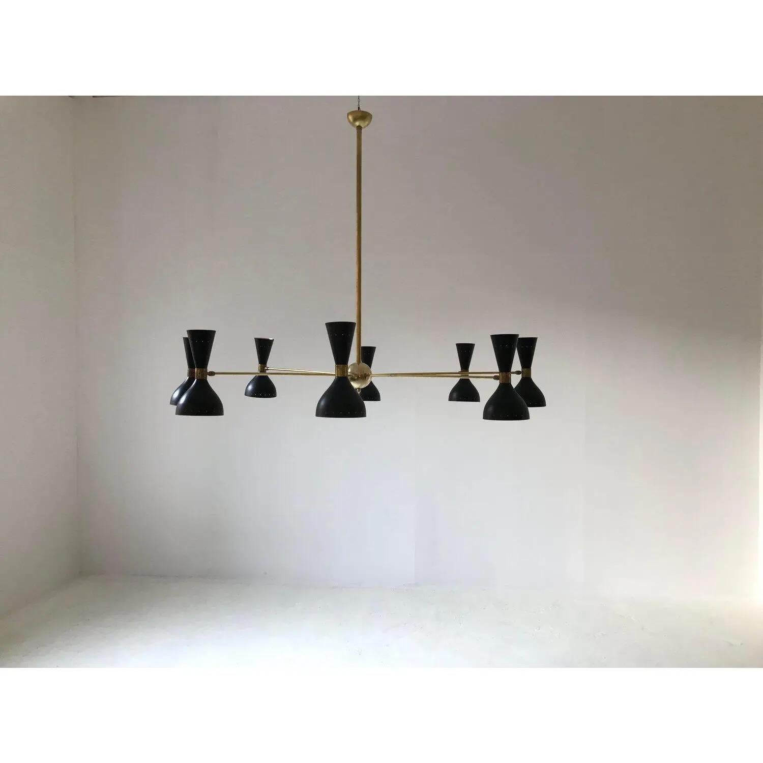 Italian 8 arms mid century style brass chandelier featuring 8 shades with double lighting, for a total of 16 lights, 2 bulbs per shade, one larger and one smaller attachment. Available in black or ivory white, with white or gold shade interiors. On