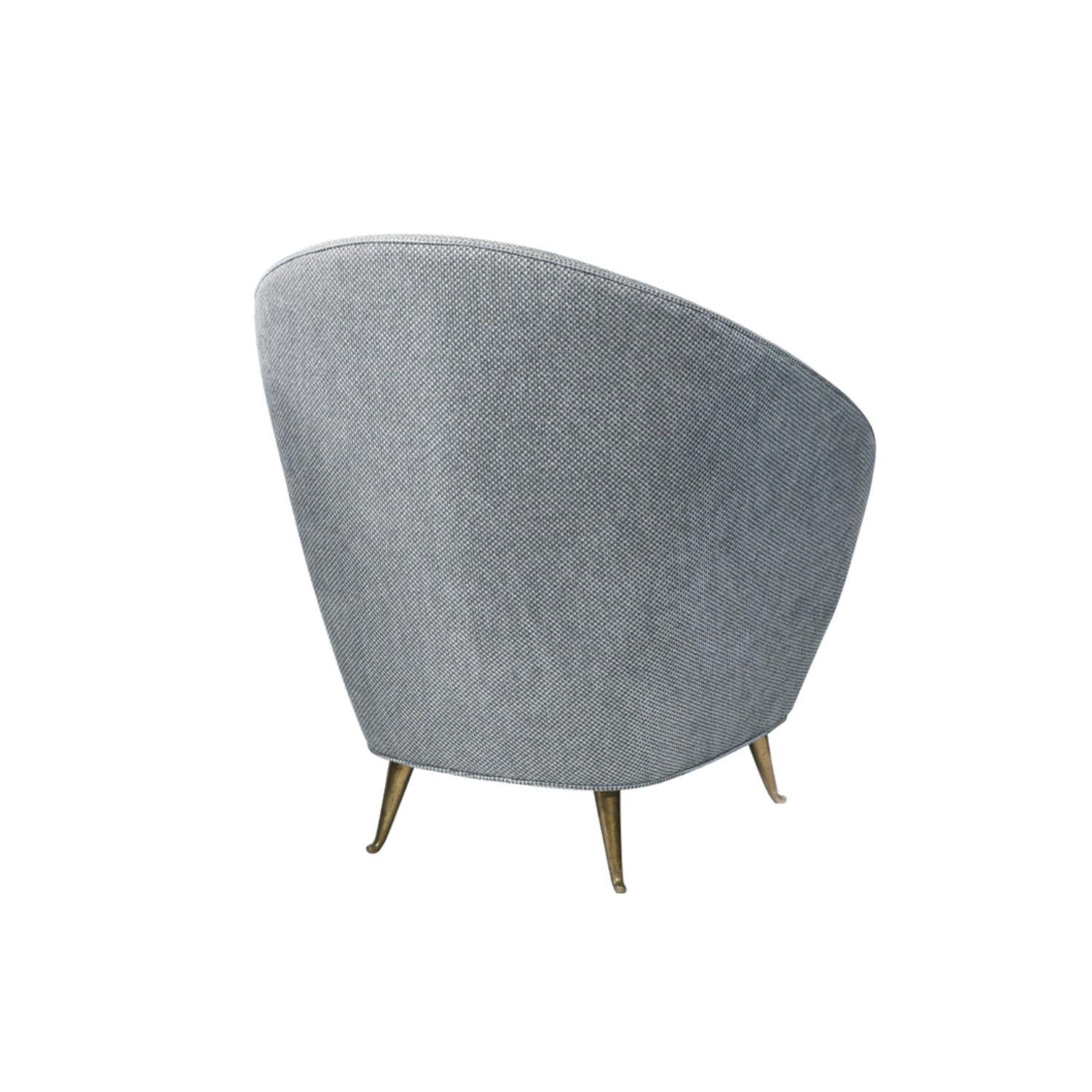 Elegant curved back lounge chair with solid brass legs, Italian 1950s. This has been newly reupholstered by Lobel Modern in a beautiful blue/gray fabric. It is extremely chic and comfortable.