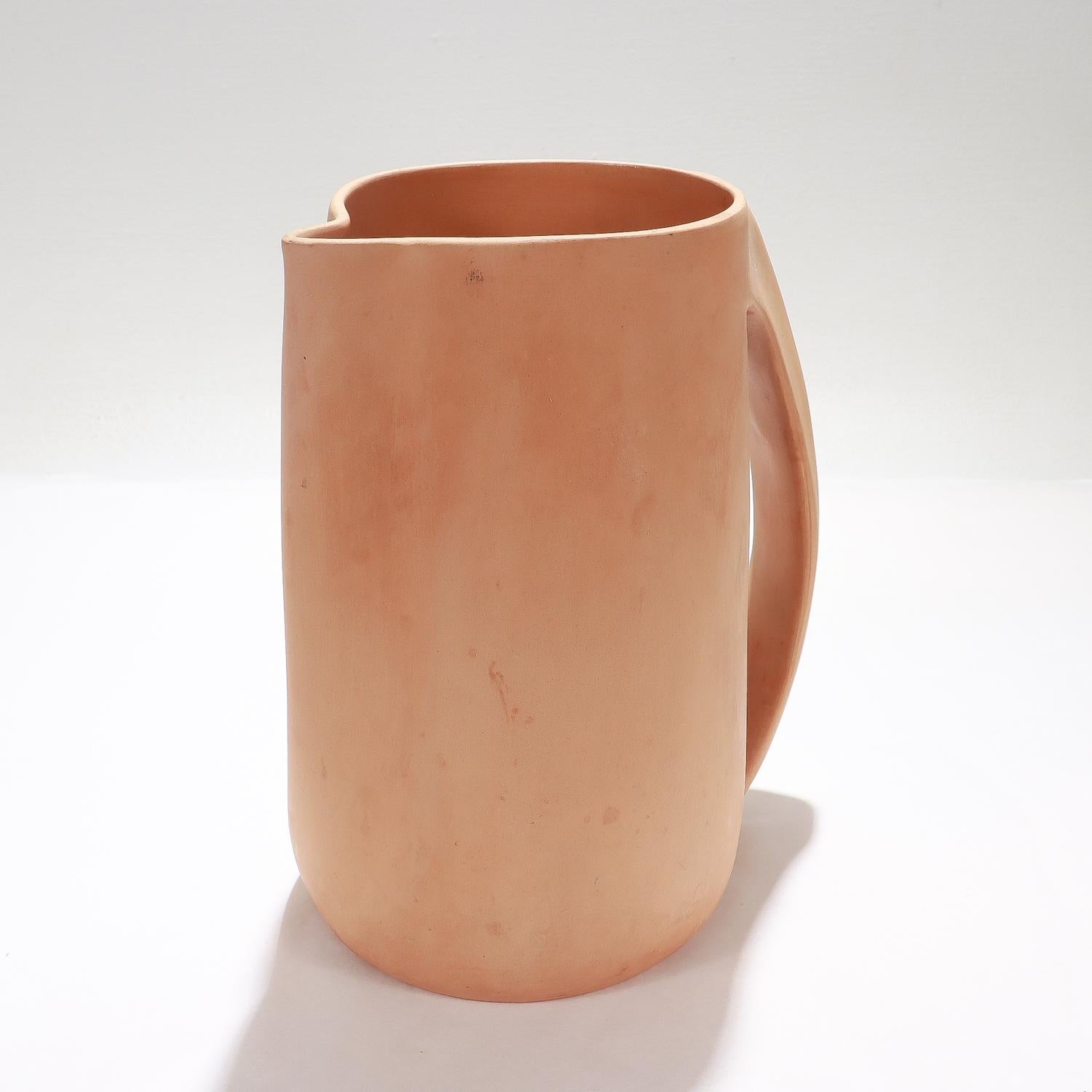 A fine designer ceramic pitcher.

In terracotta.

By Elsa Peretti for Tiffany & Co.

In the 'Thumbprint' pattern.

Marked to the base for E. Peretti for Tiffany / Italy.

Simply a wonderful pitcher!

Date:
20th Century

Overall Condition:
It is in