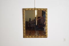 Italian, Emiliana, Late Louis XIV Period Carved Giltwood MIrror, ca. 1740