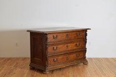 Italian, Emiliana, Louis XIV Period Carved Walnut Cassettone, early 18th century