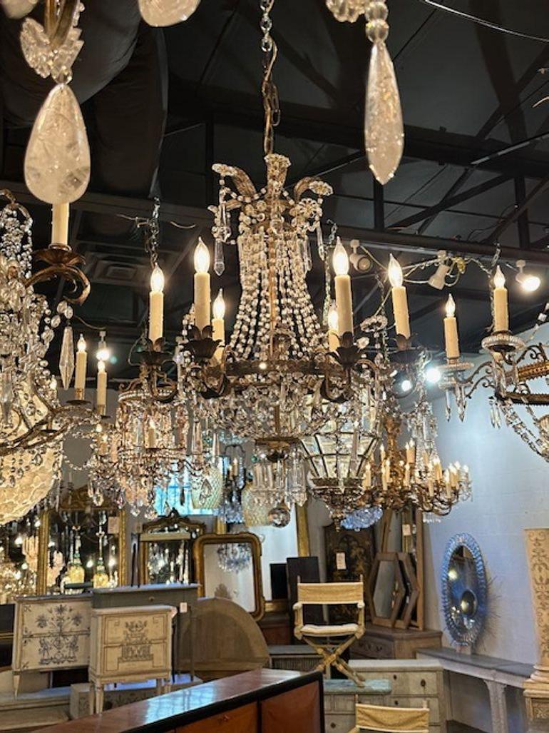 Late 19th century Italian empire style crystal basket chandelier. Circa 1880. The chandelier has been professionally rewired, comes with matching chain and canopy. It is ready to hang!