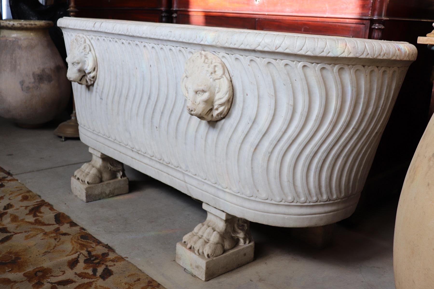 Rare antique bathtub Napoleon's Italian Empire, 1800s in white Carrara marble with carved decorations. The bathtub is presented to you as we found it with all the fascinating signs of the time. This item is really special and rare perfect for a