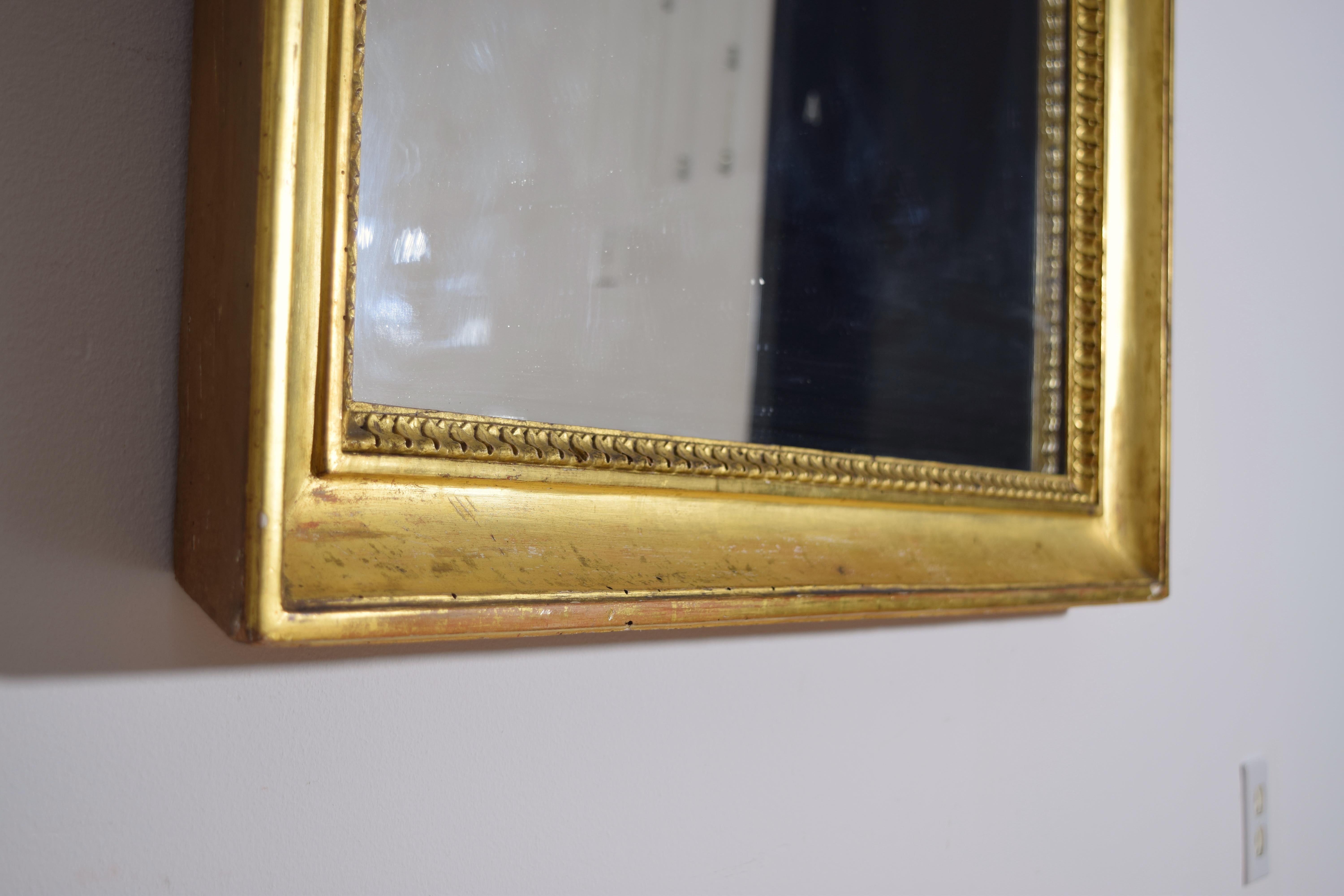 Italienischer Empire-Spiegel aus geschnitztem Giltwood und Gilt-Gesso, frühes 19. im Angebot 1